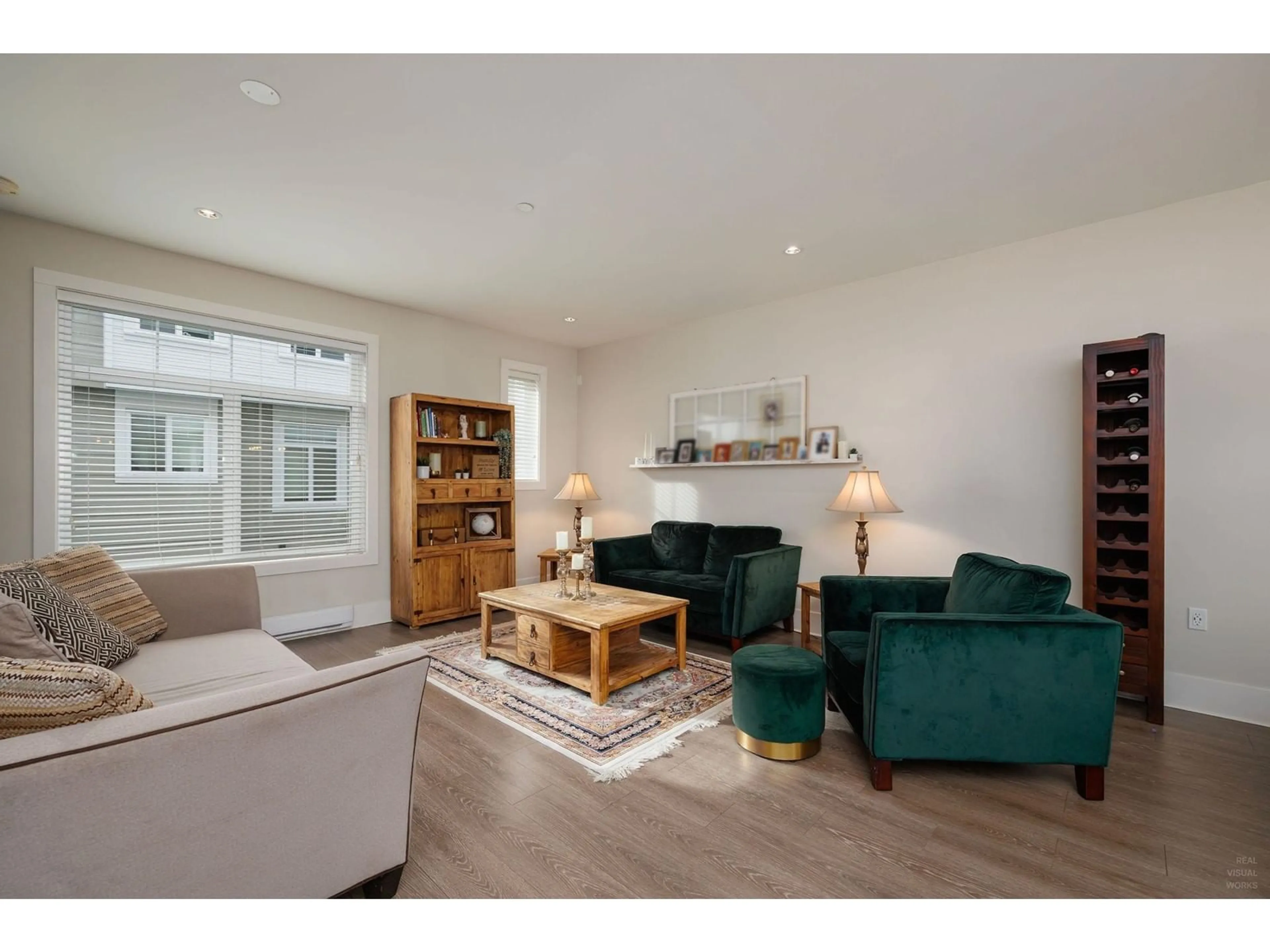 Living room with furniture, wood/laminate floor for 12 - 7665 209, Langley British Columbia V2Y0V2
