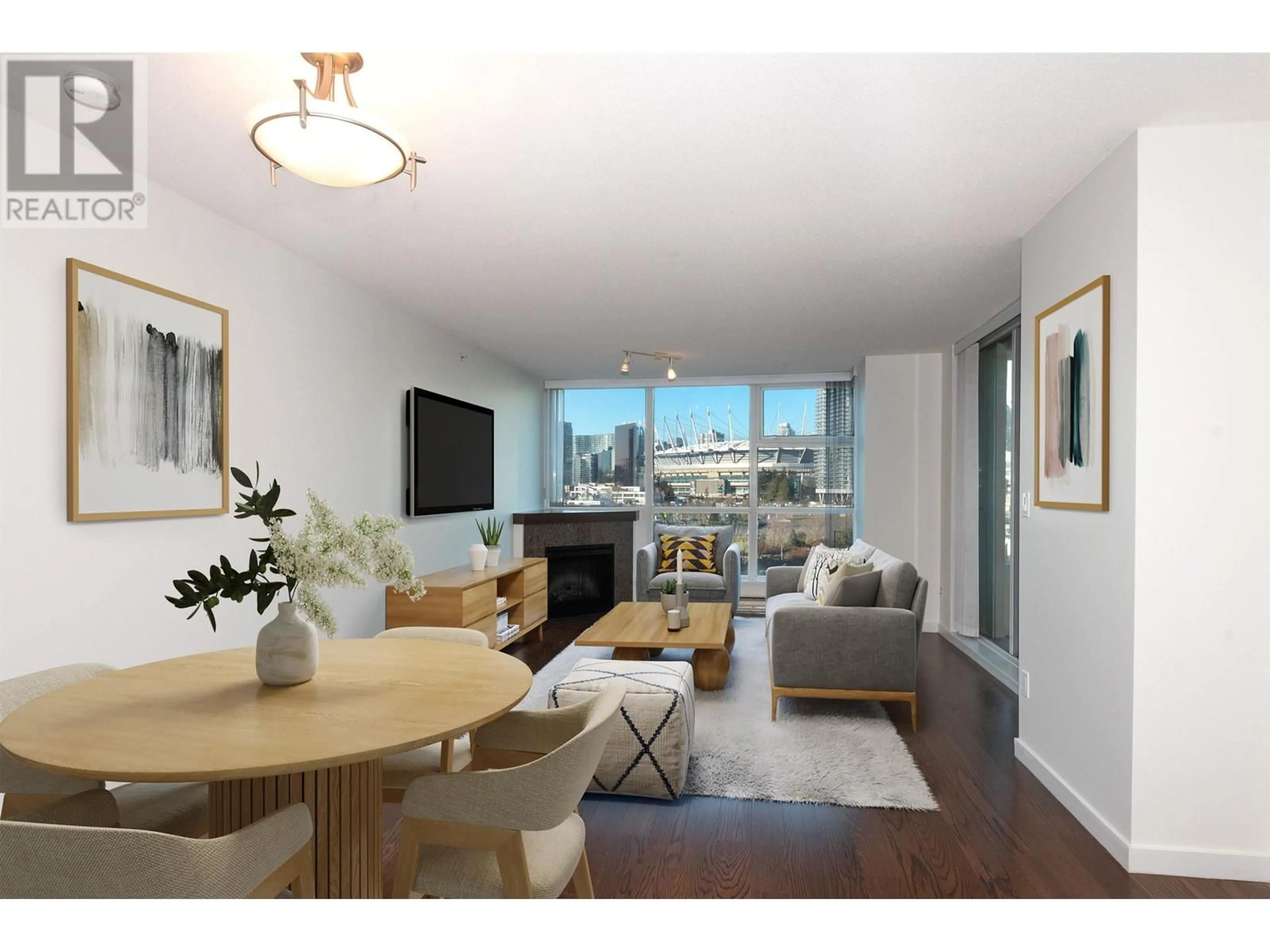 Living room with furniture, wood/laminate floor for 506 - 125 MILROSS AVENUE, Vancouver British Columbia V6A0A1
