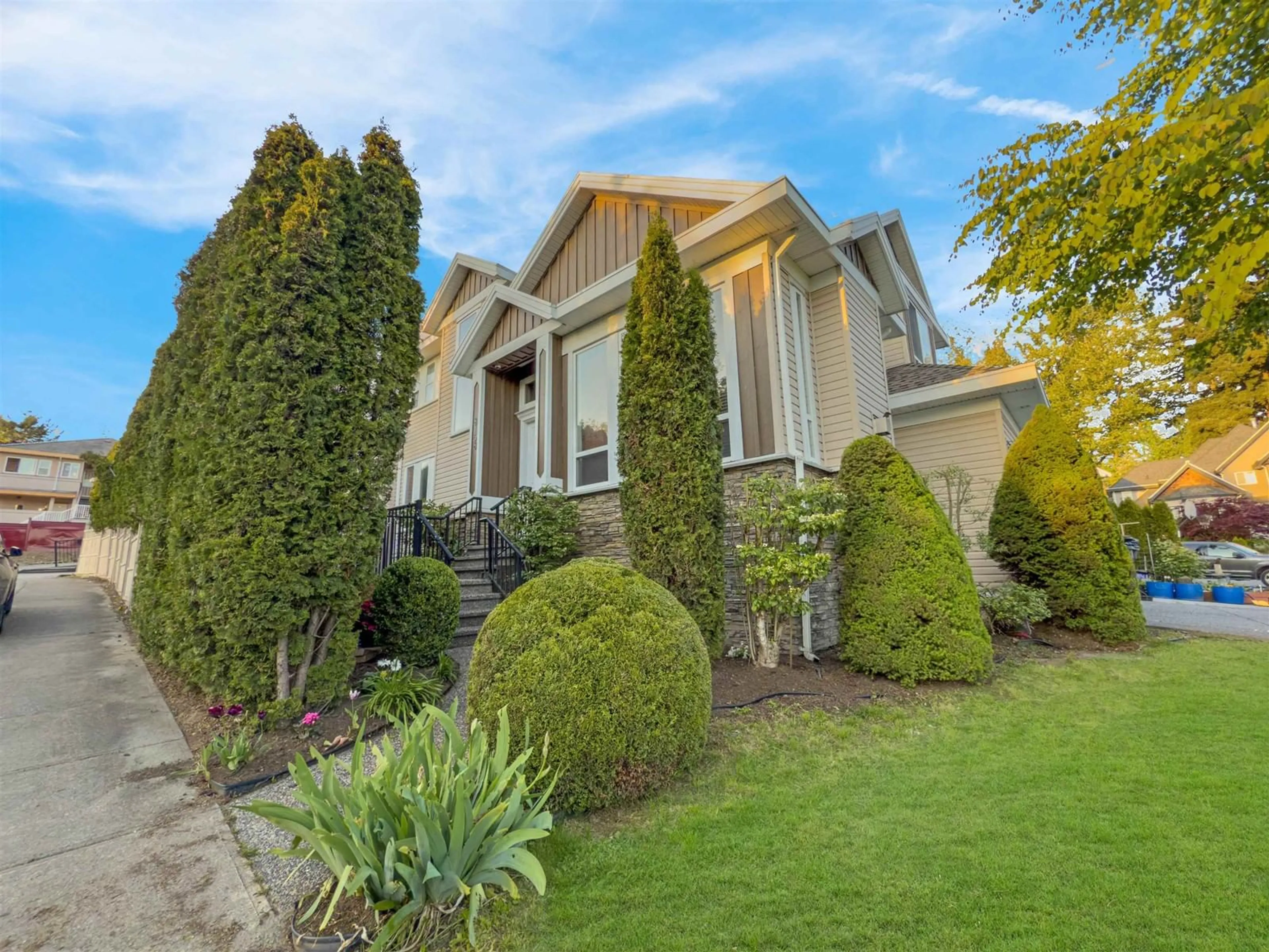 Home with vinyl exterior material, street for 8158 152, Surrey British Columbia V3S9Y8