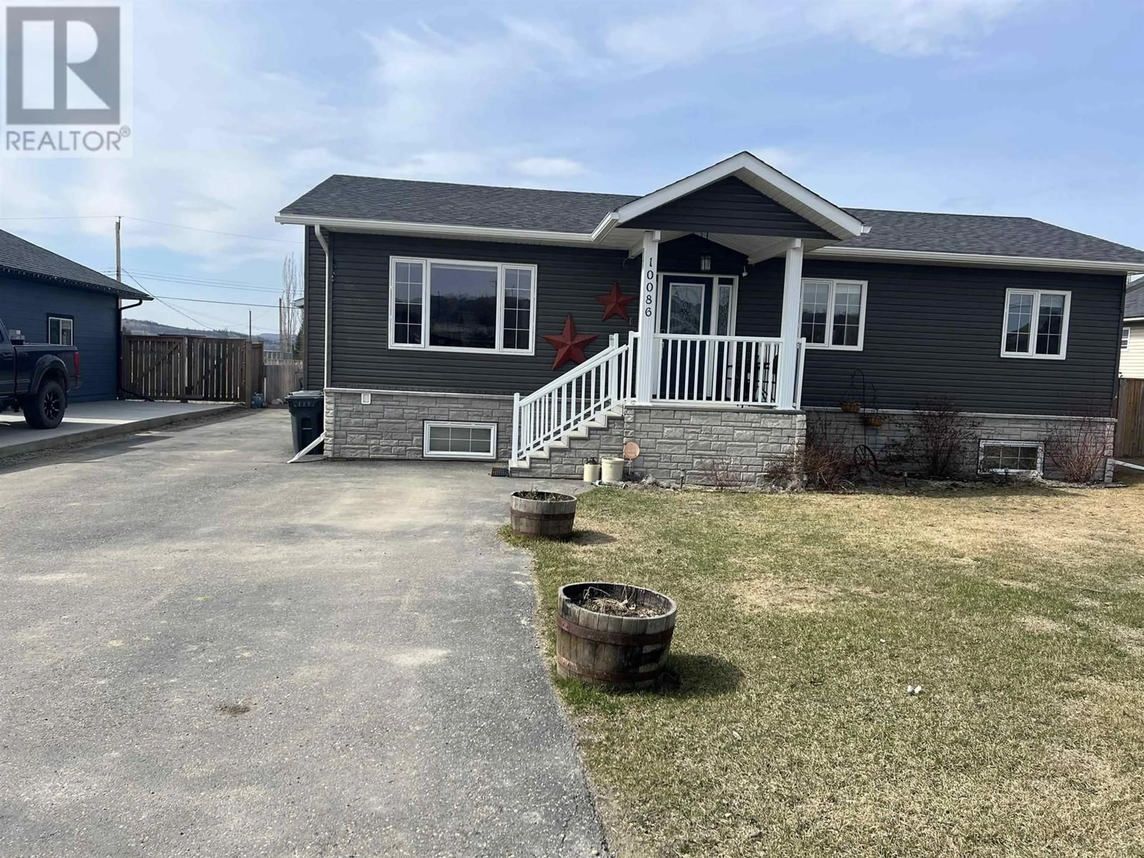 Home with vinyl exterior material, street for 10086 97 STREET, Taylor British Columbia V0C2K0