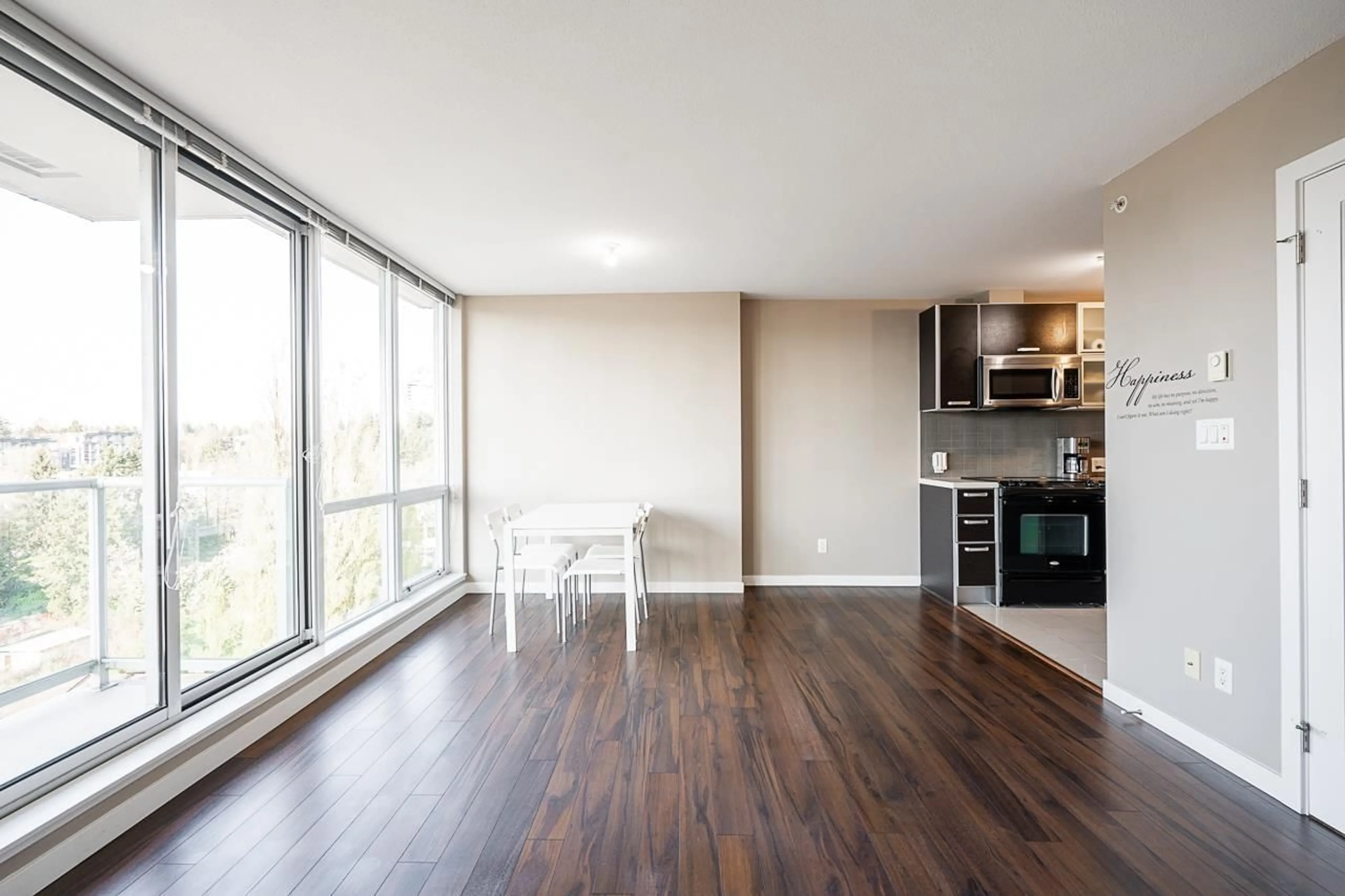 Living room with furniture, wood/laminate floor for 806 - 13688 100, Surrey British Columbia V3T0G5