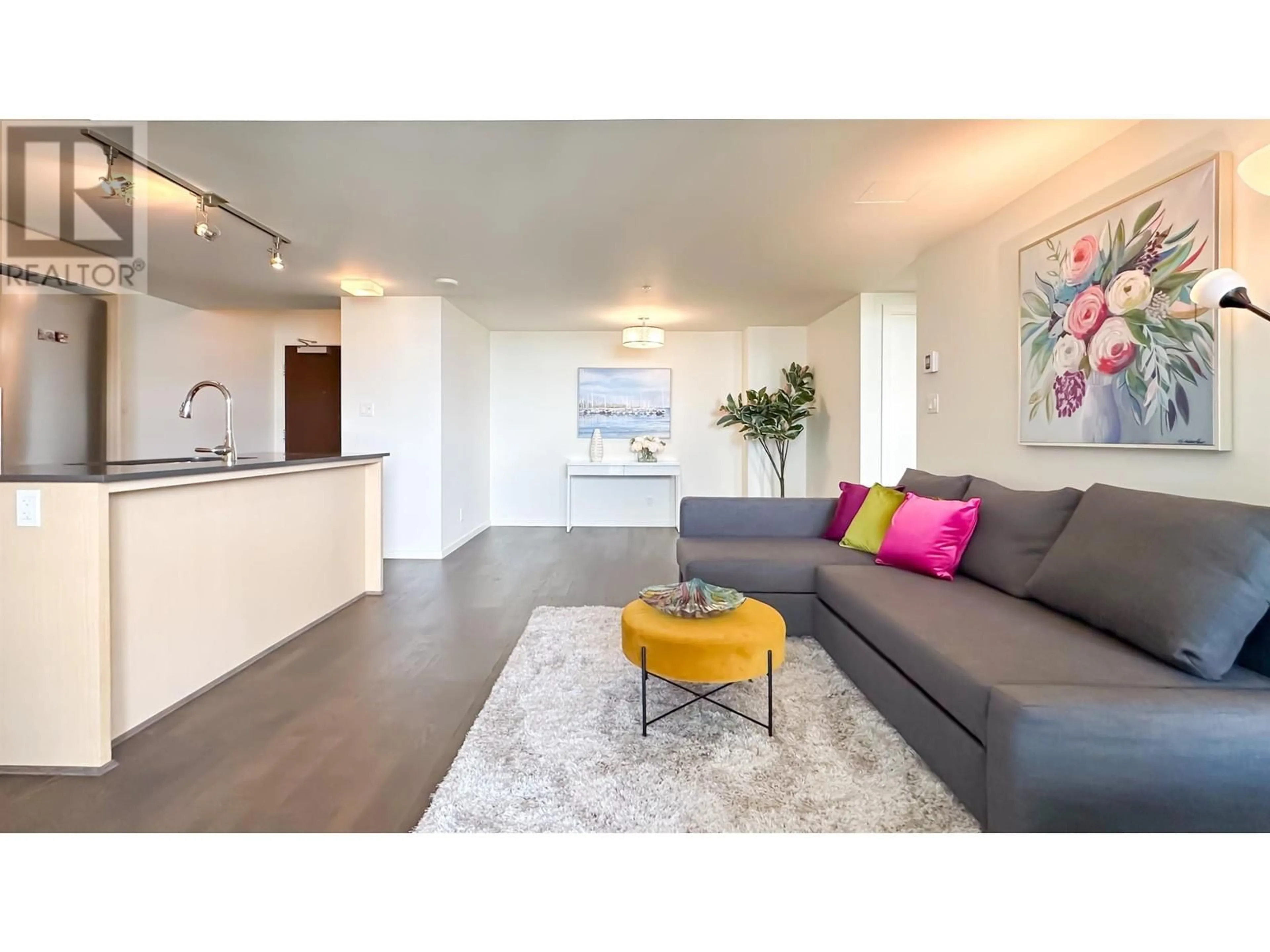 Living room with furniture, wood/laminate floor for 1513 - 7788 ACKROYD ROAD, Richmond British Columbia V6X0M8