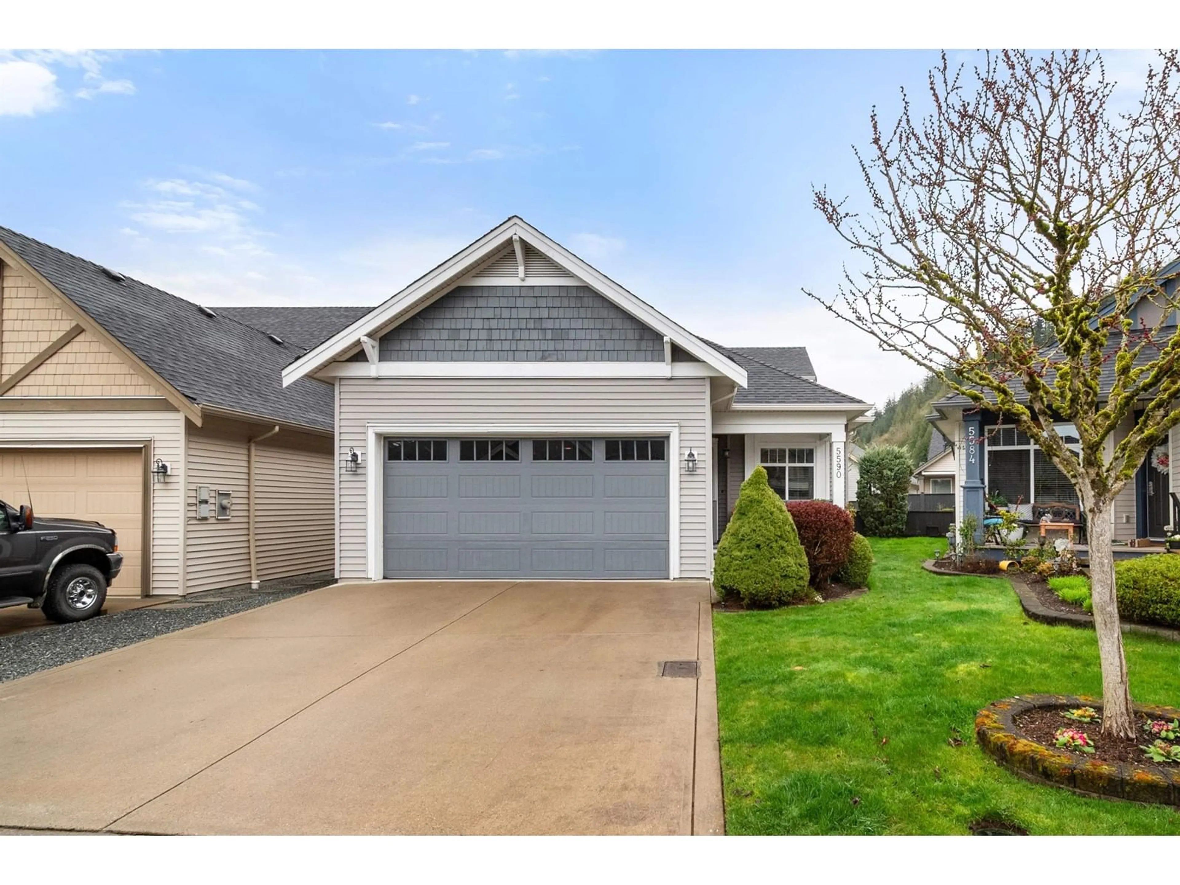 Home with vinyl exterior material, street for 5590 CRAWLEY DRIVE, Chilliwack British Columbia V2R0P7