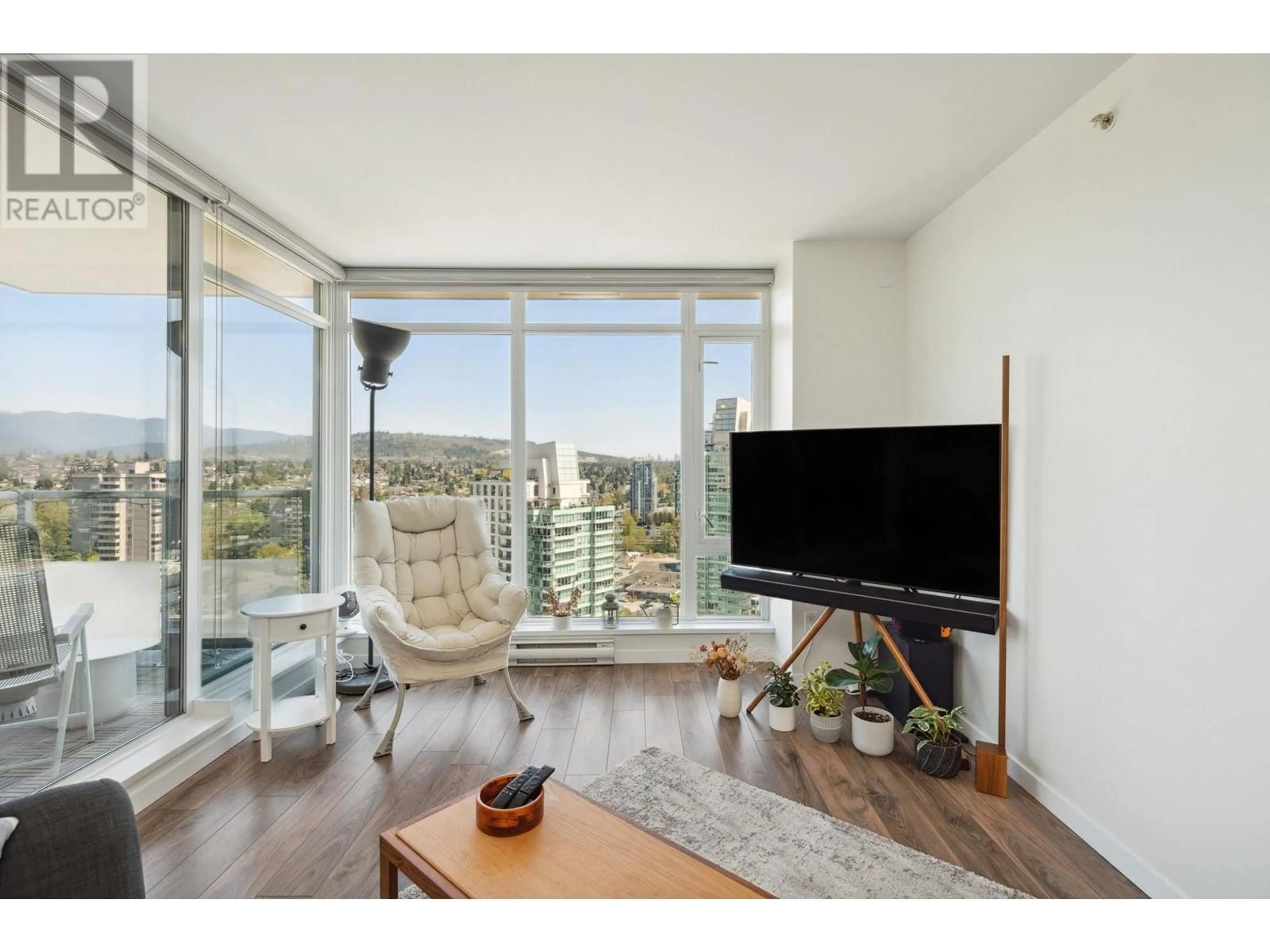 Living room with furniture, wood/laminate floor for 2905 - 2133 DOUGLAS ROAD, Burnaby British Columbia V5C0E9