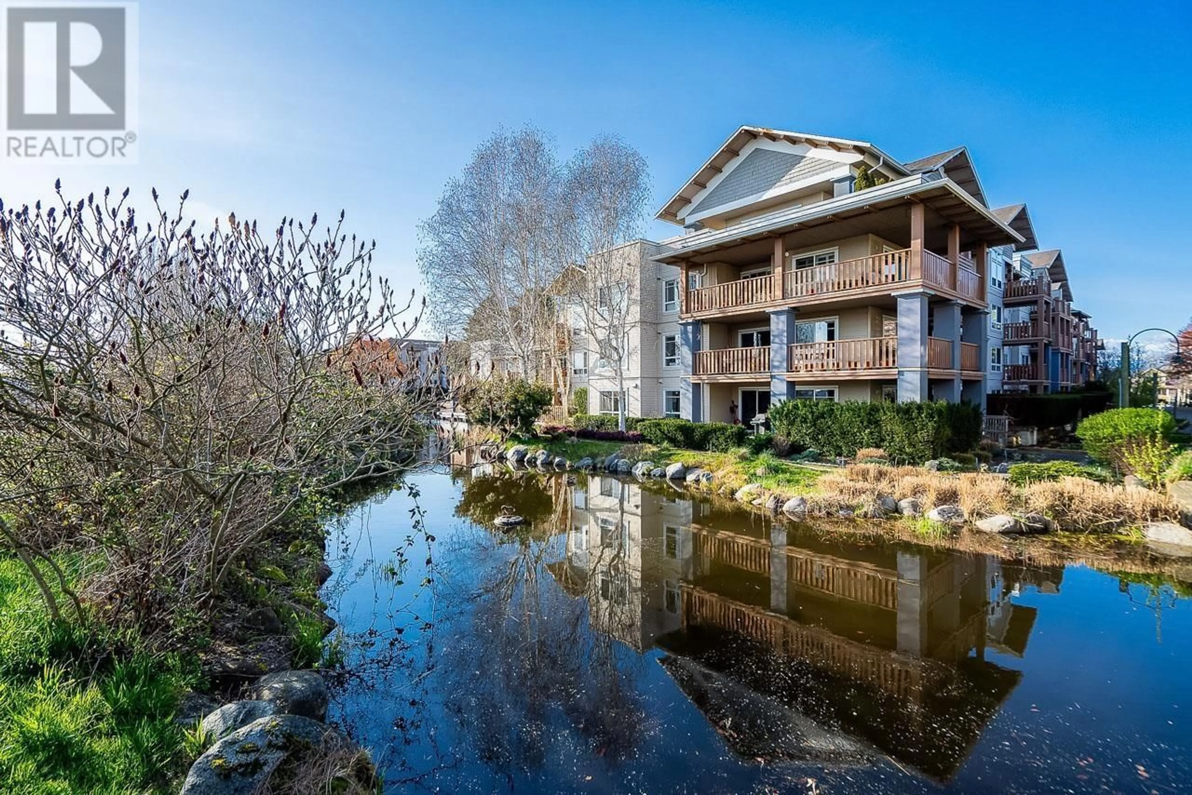 A pic from outside/outdoor area/front of a property/back of a property/a pic from drone, water/lake/river/ocean view for 403 - 5600 ANDREWS ROAD, Richmond British Columbia V7E6N1