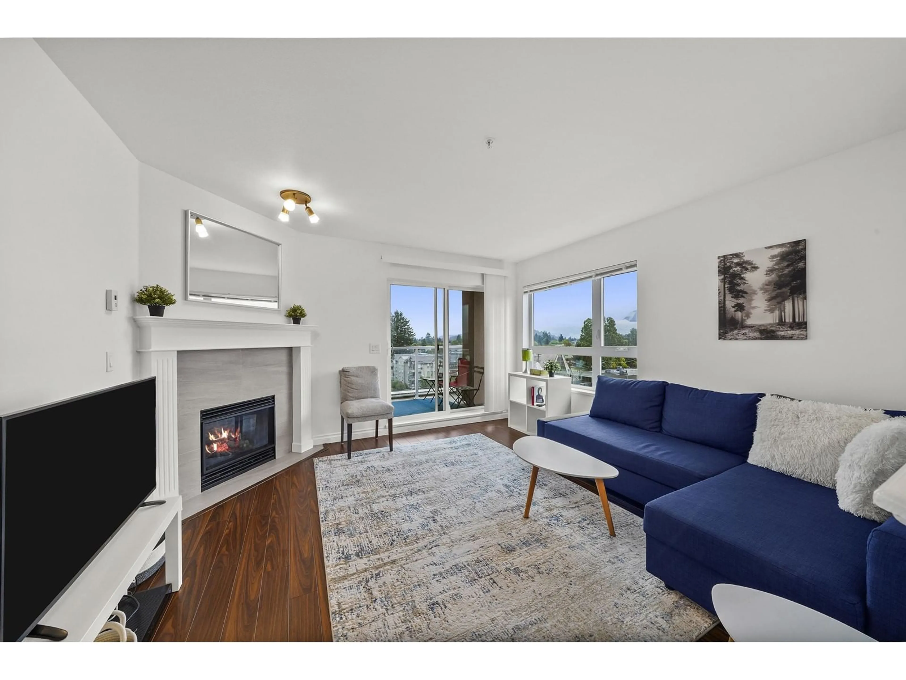 Living room with furniture, wood/laminate floor for 601 - 45745 PRINCESS AVENUE, Chilliwack British Columbia V2P2B5