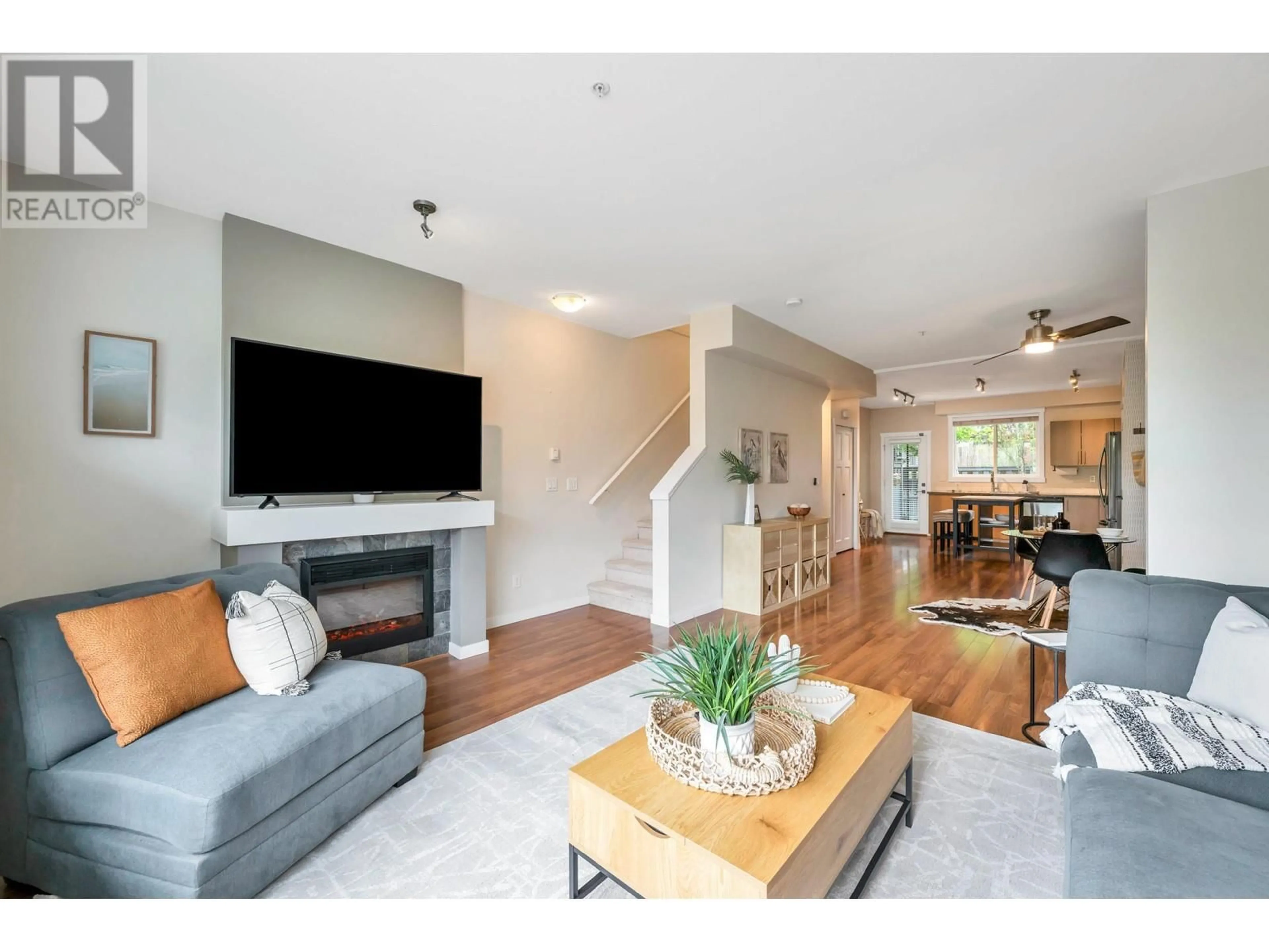 Living room with furniture, wood/laminate floor for 61 - 13819 232 STREET, Maple Ridge British Columbia V4R0C7