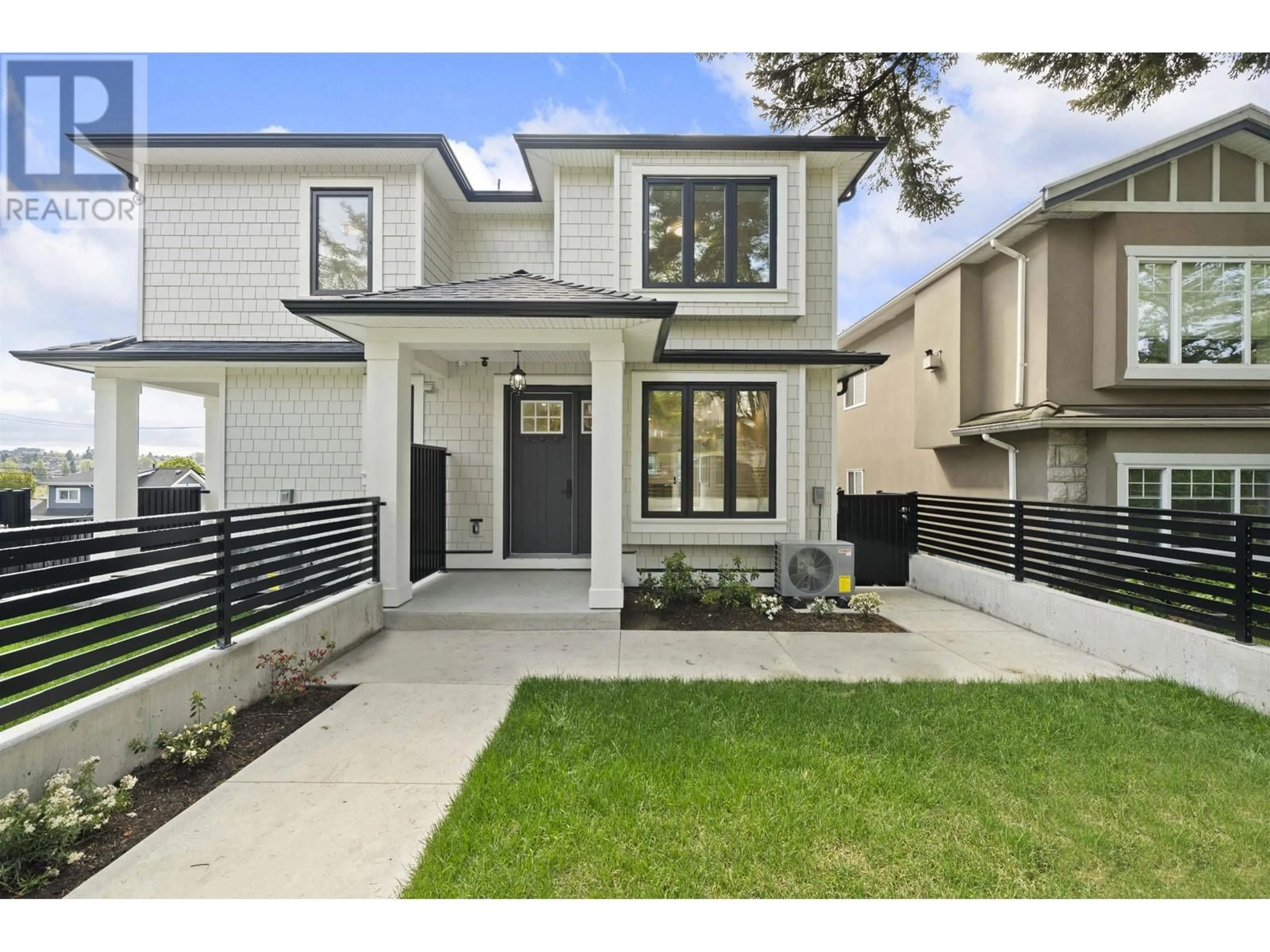 Home with vinyl exterior material, street for 2996 8TH AVENUE, Vancouver British Columbia V5M1X1