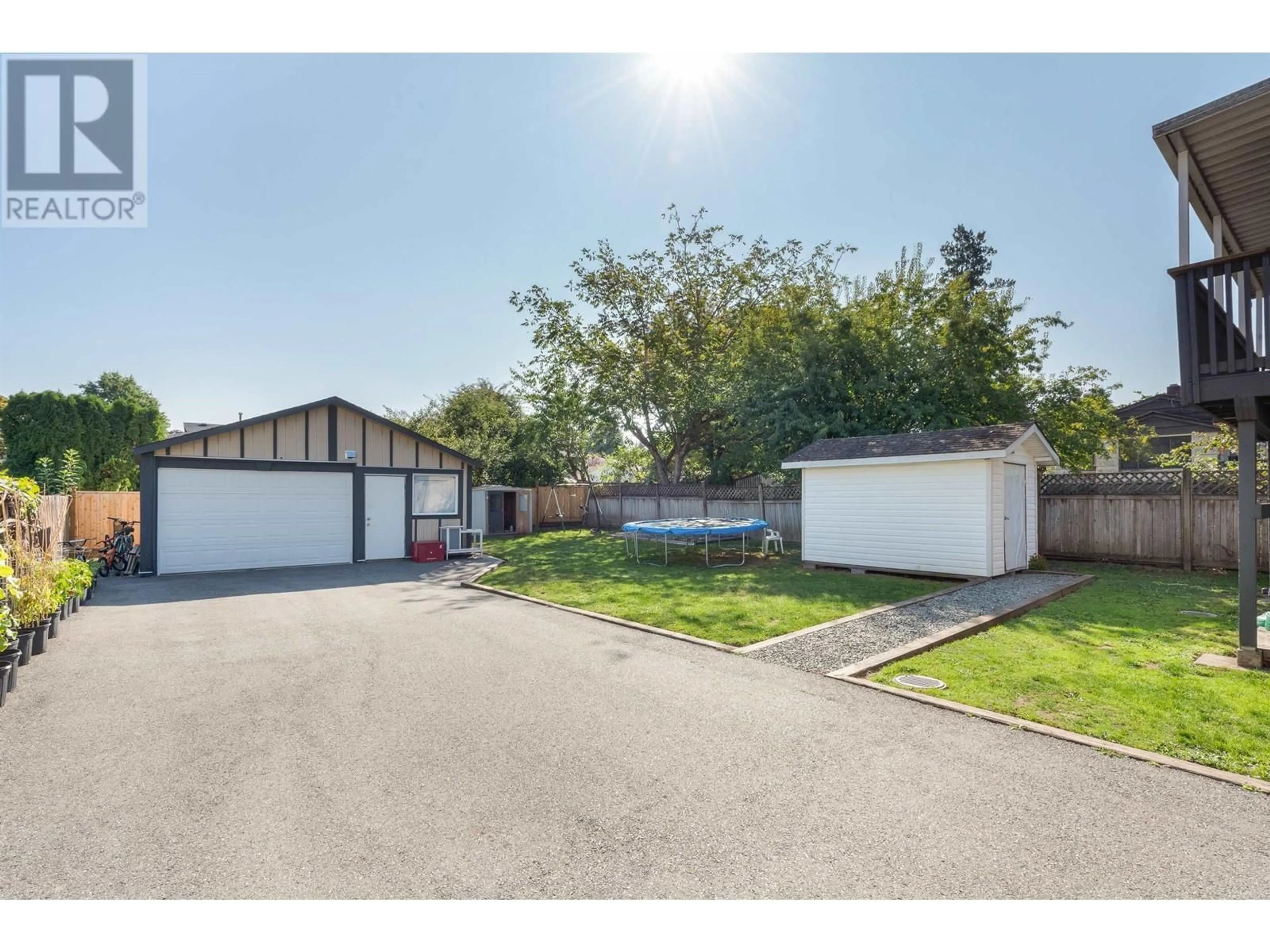 A pic from outside/outdoor area/front of a property/back of a property/a pic from drone, street for 12344 228 STREET, Maple Ridge British Columbia V2X6M4
