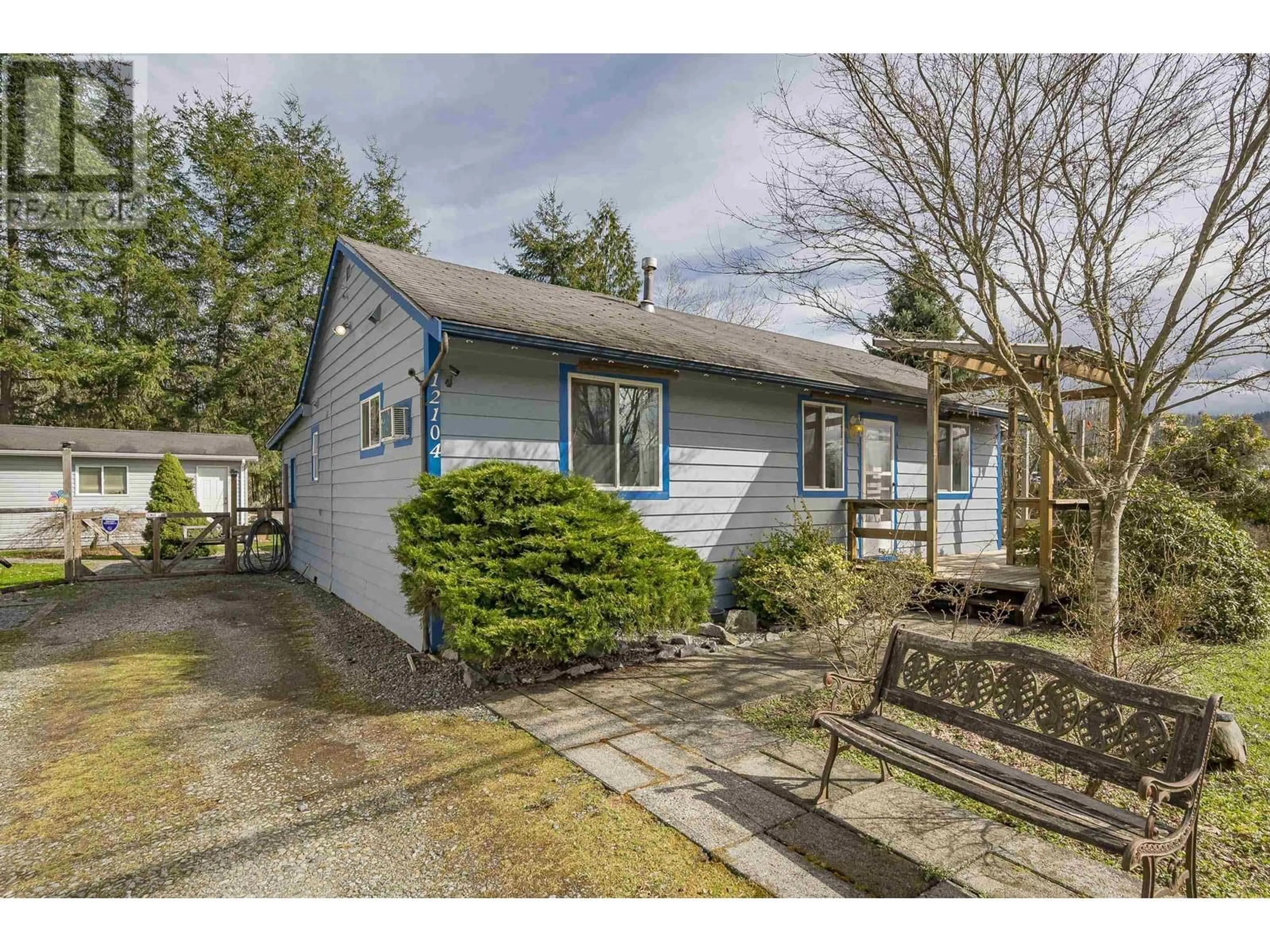 Home with vinyl exterior material, street for 12104 252 STREET, Maple Ridge British Columbia V4R1G2
