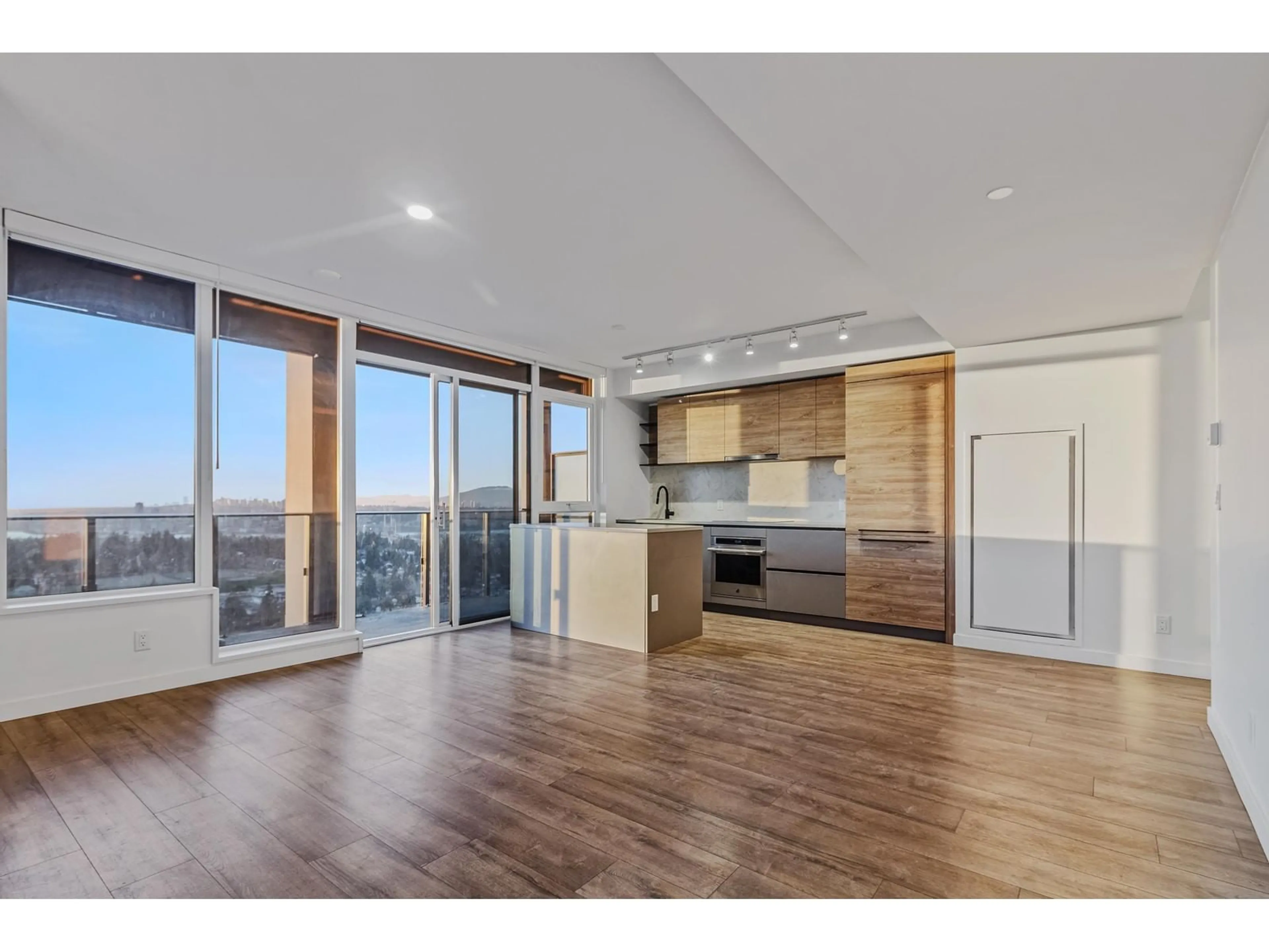 Open concept kitchen, wood/laminate floor for 3310 - 10448 UNIVERSITY, Surrey British Columbia V3T0S7