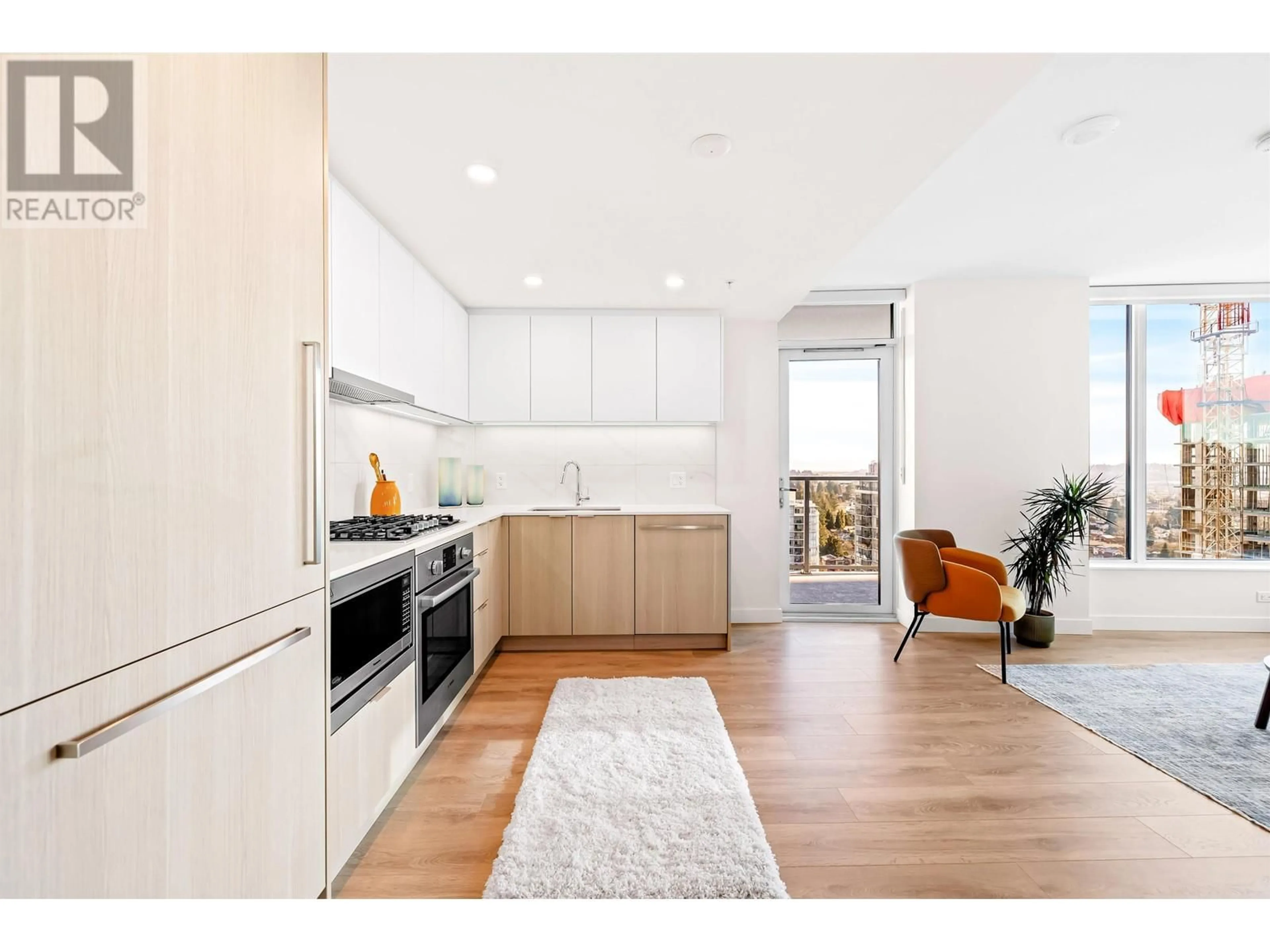 Open concept kitchen, wood/laminate floor for 2004 - 318 ALDERSON AVENUE, Coquitlam British Columbia V3K0J1