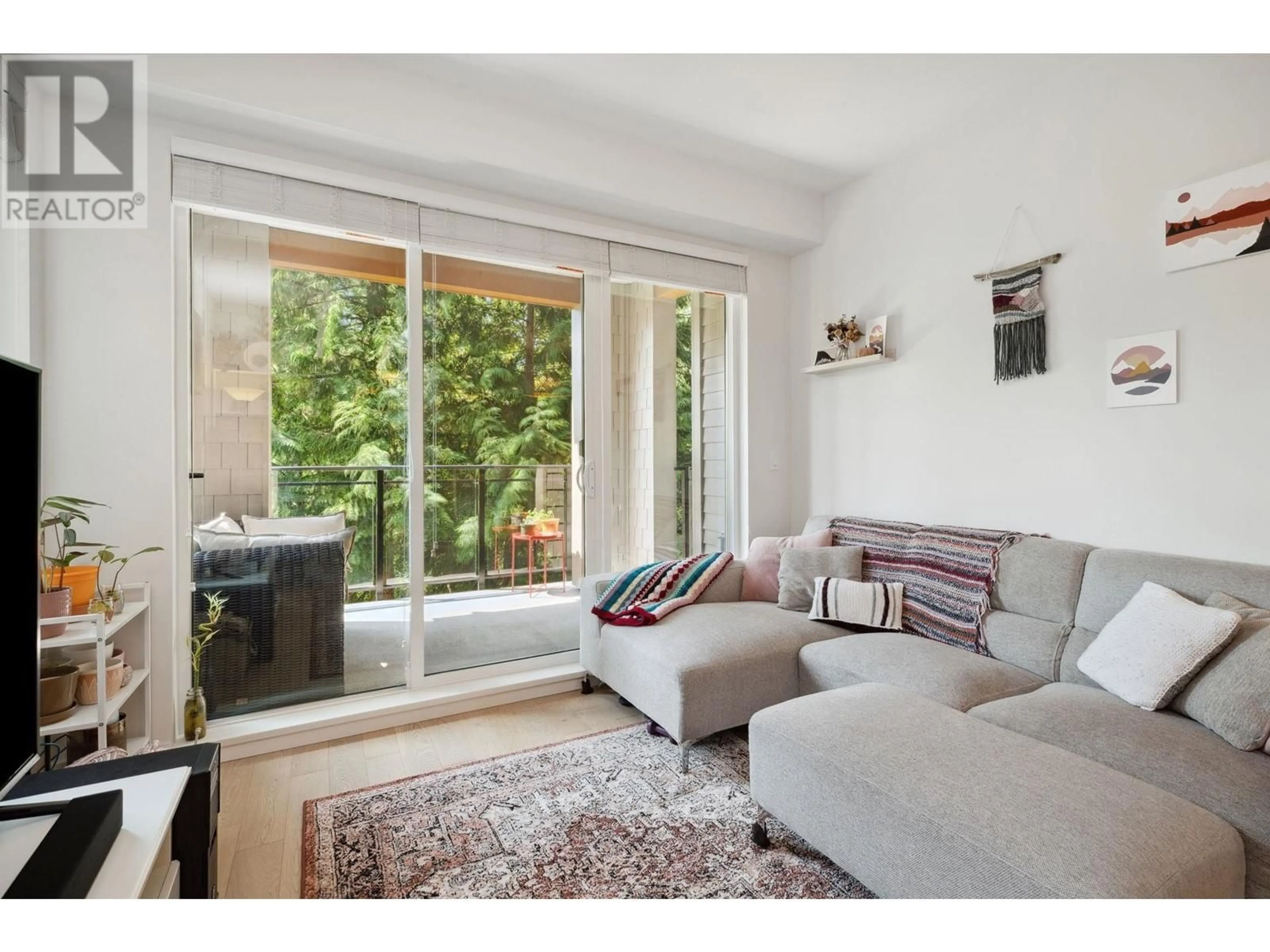 Living room with furniture, wood/laminate floor for 305 - 3399 NOEL DRIVE, Burnaby British Columbia V3J0G8