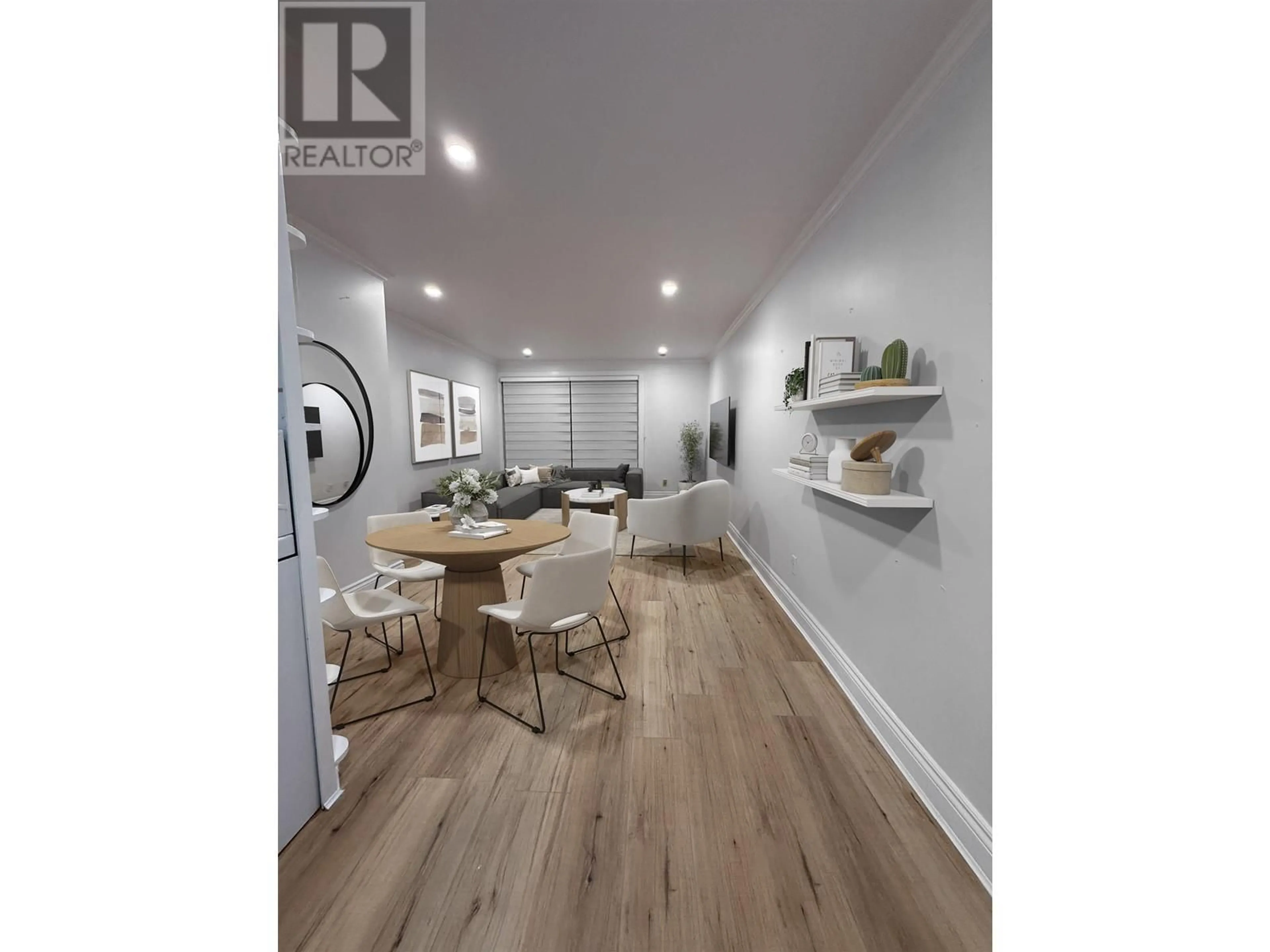 Open concept kitchen, wood/laminate floor for 210 - 2040 CORNWALL AVENUE, Vancouver British Columbia V6J1E1