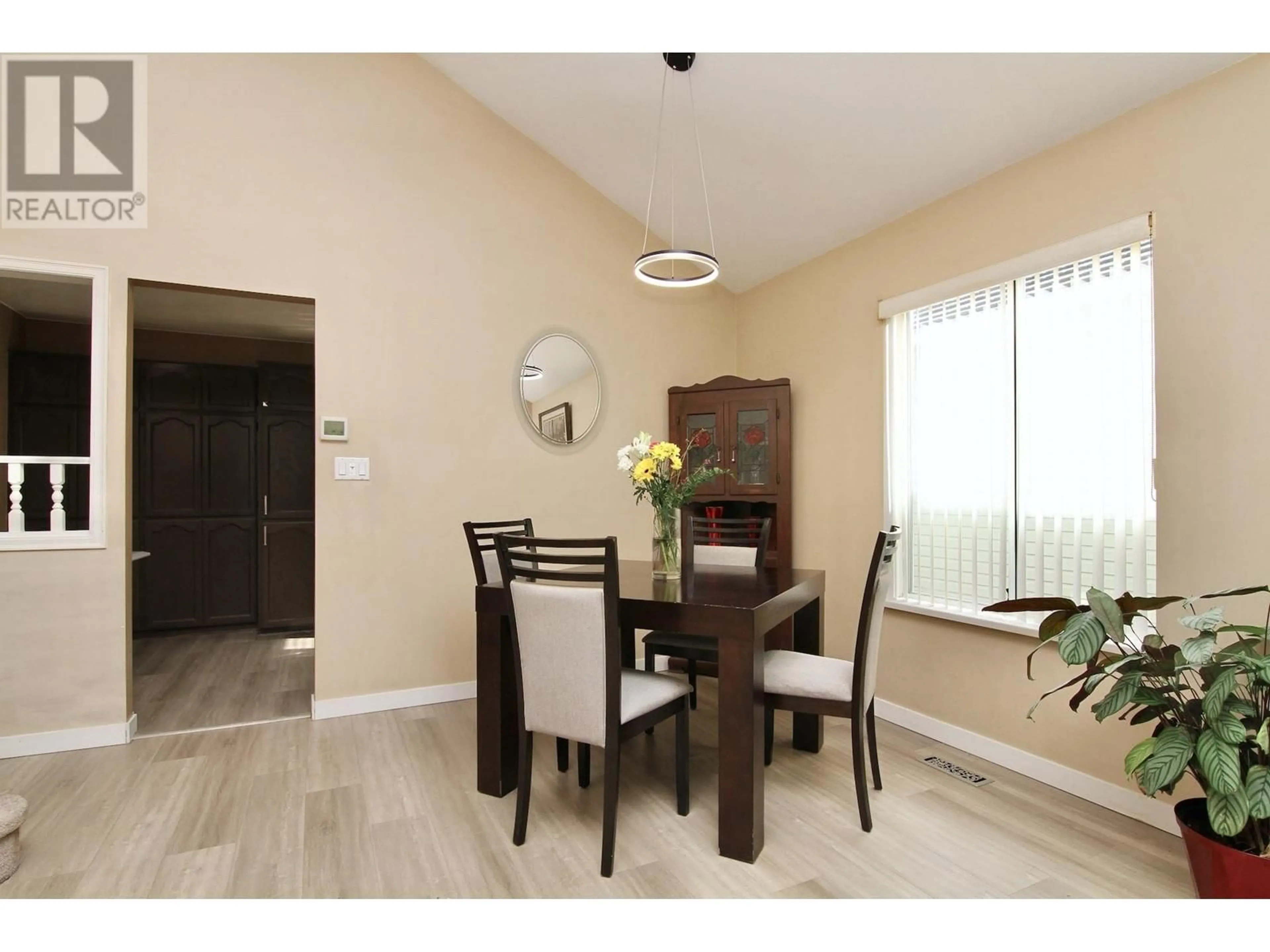 Dining room, wood/laminate floor for 11465 207A STREET, Maple Ridge British Columbia V2X0C7