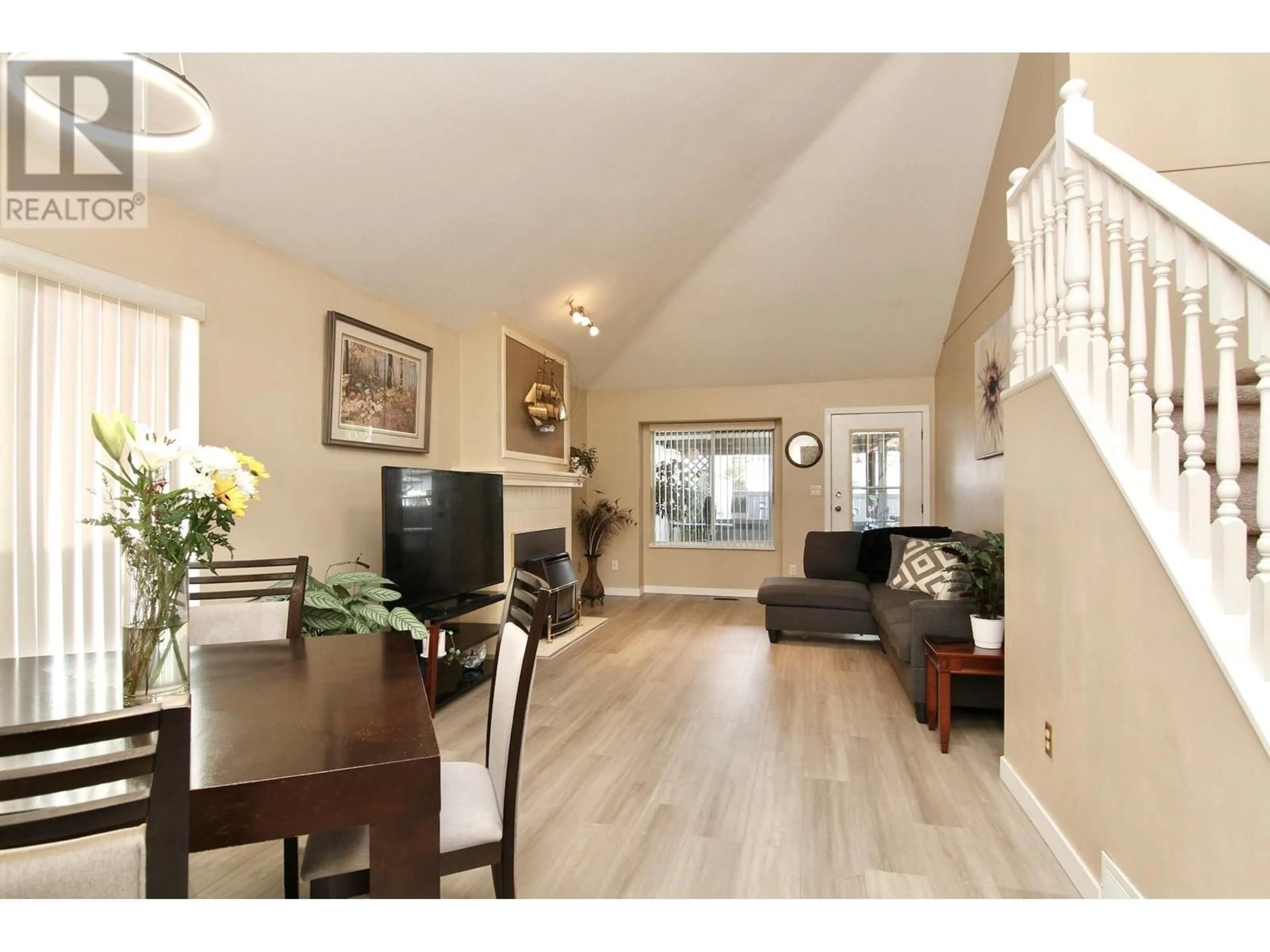 Living room with furniture, wood/laminate floor for 11465 207A STREET, Maple Ridge British Columbia V2X0C7