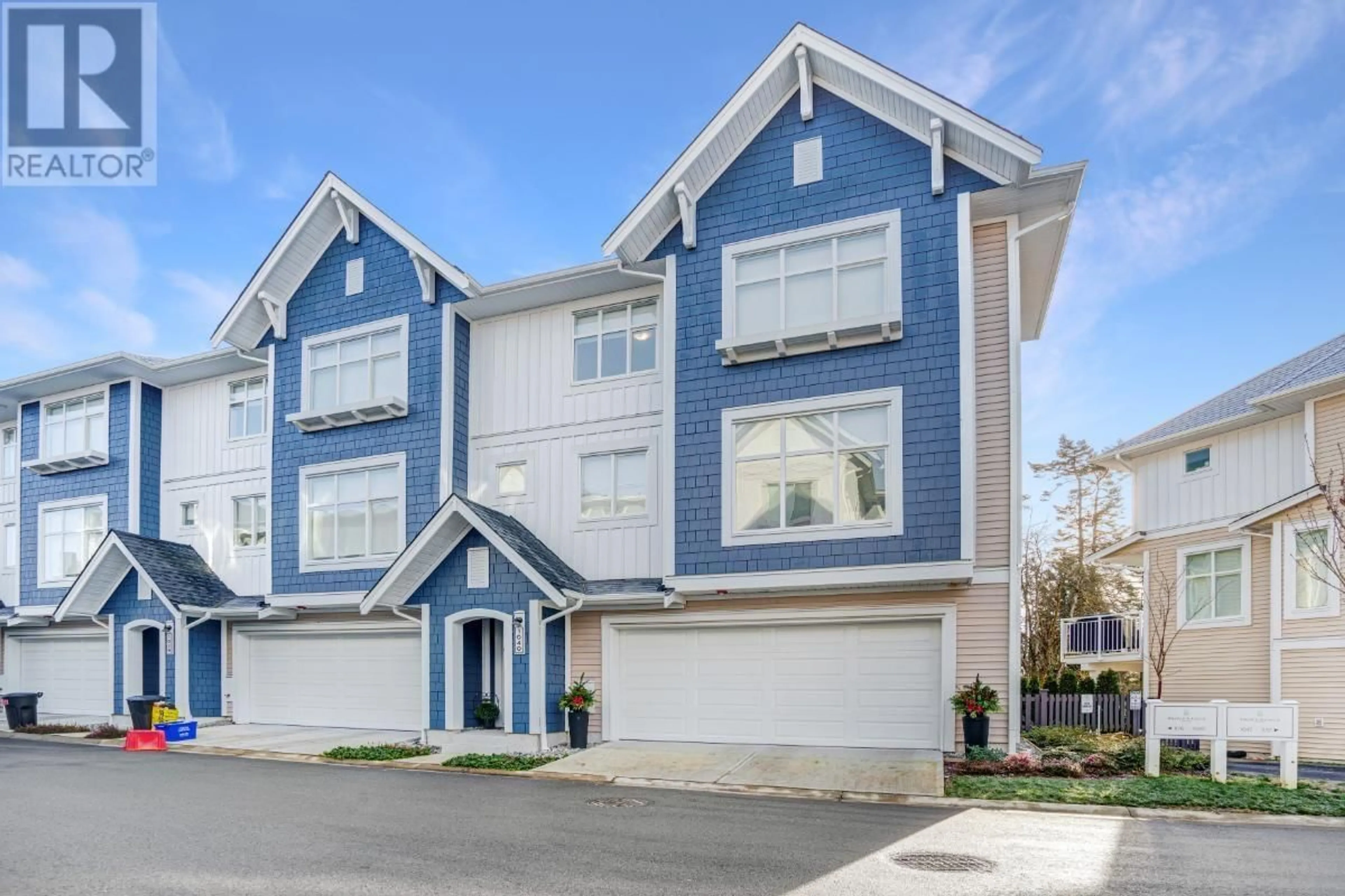 Home with vinyl exterior material, street for 1040 - 11280 PAZARENA PLACE, Maple Ridge British Columbia V2X4K9