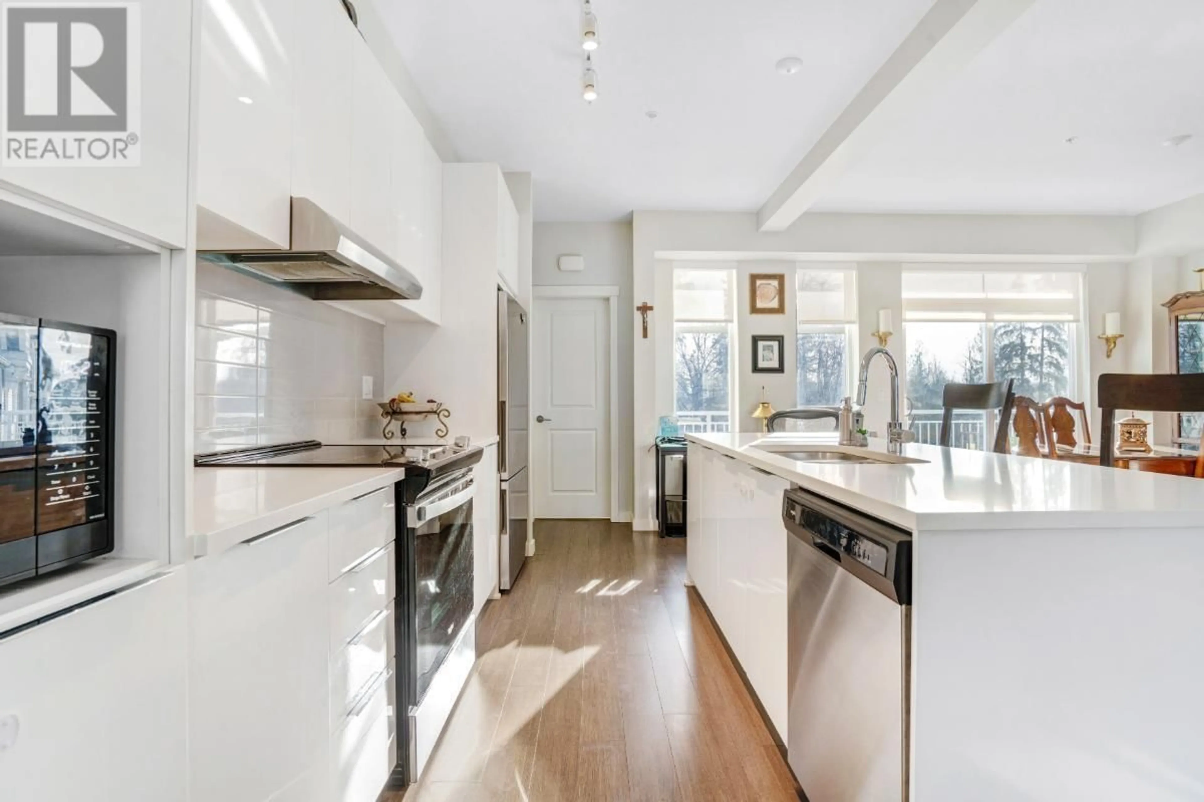 Open concept kitchen, unknown for 1040 - 11280 PAZARENA PLACE, Maple Ridge British Columbia V2X4K9
