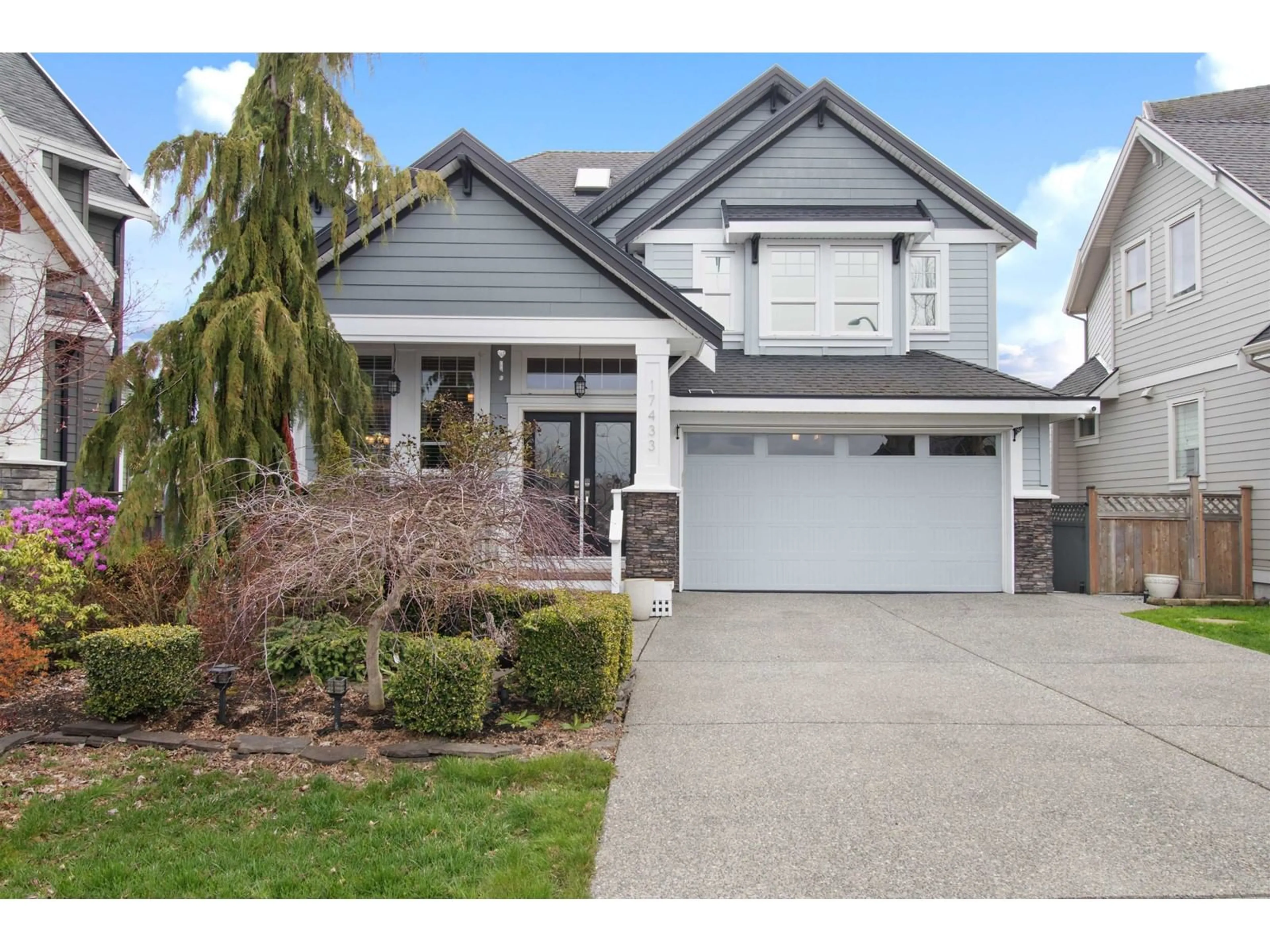 Home with vinyl exterior material, street for 17433 1, Surrey British Columbia V3Z9P9