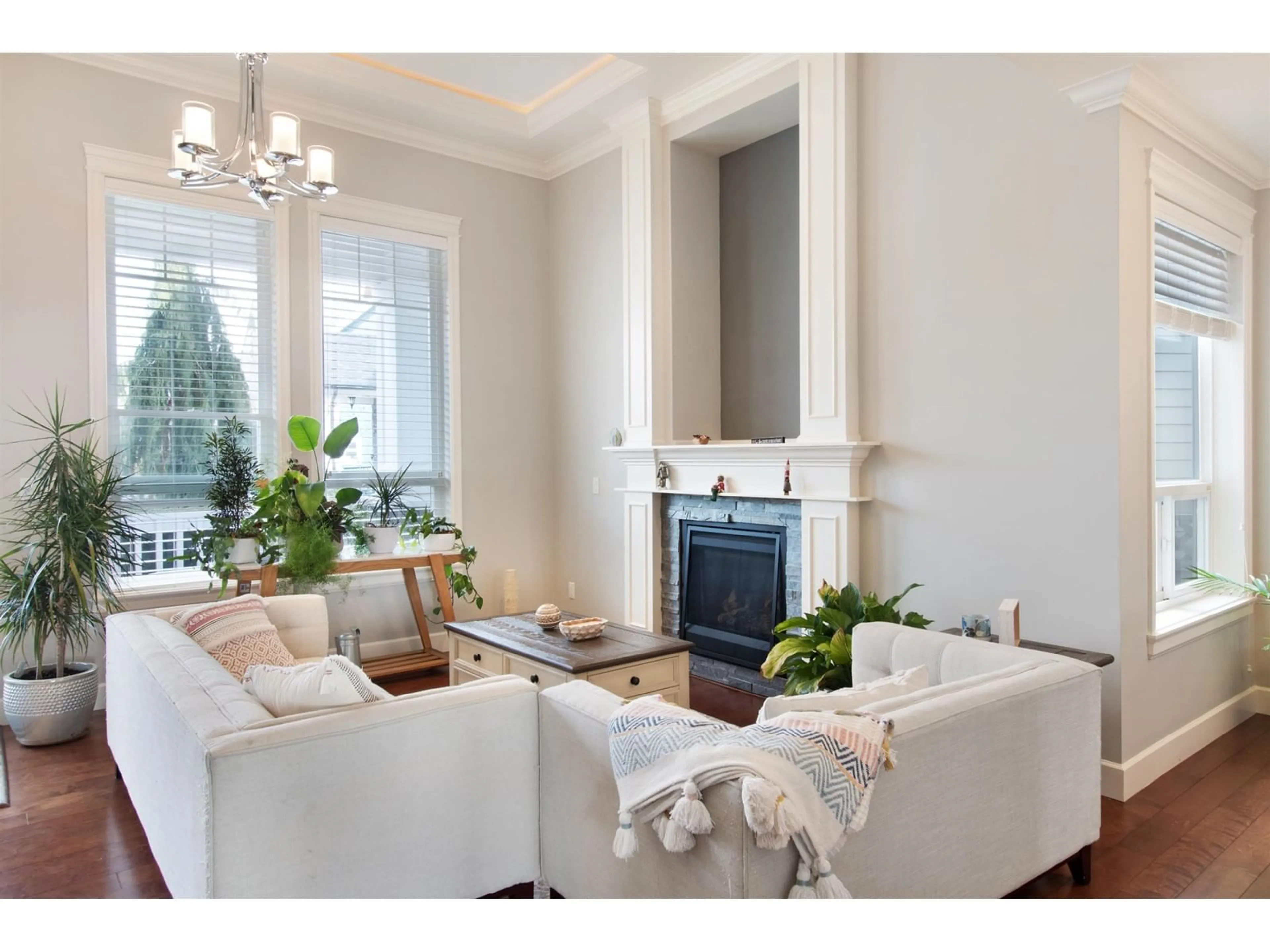 Living room with furniture, wood/laminate floor for 17433 1, Surrey British Columbia V3Z9P9