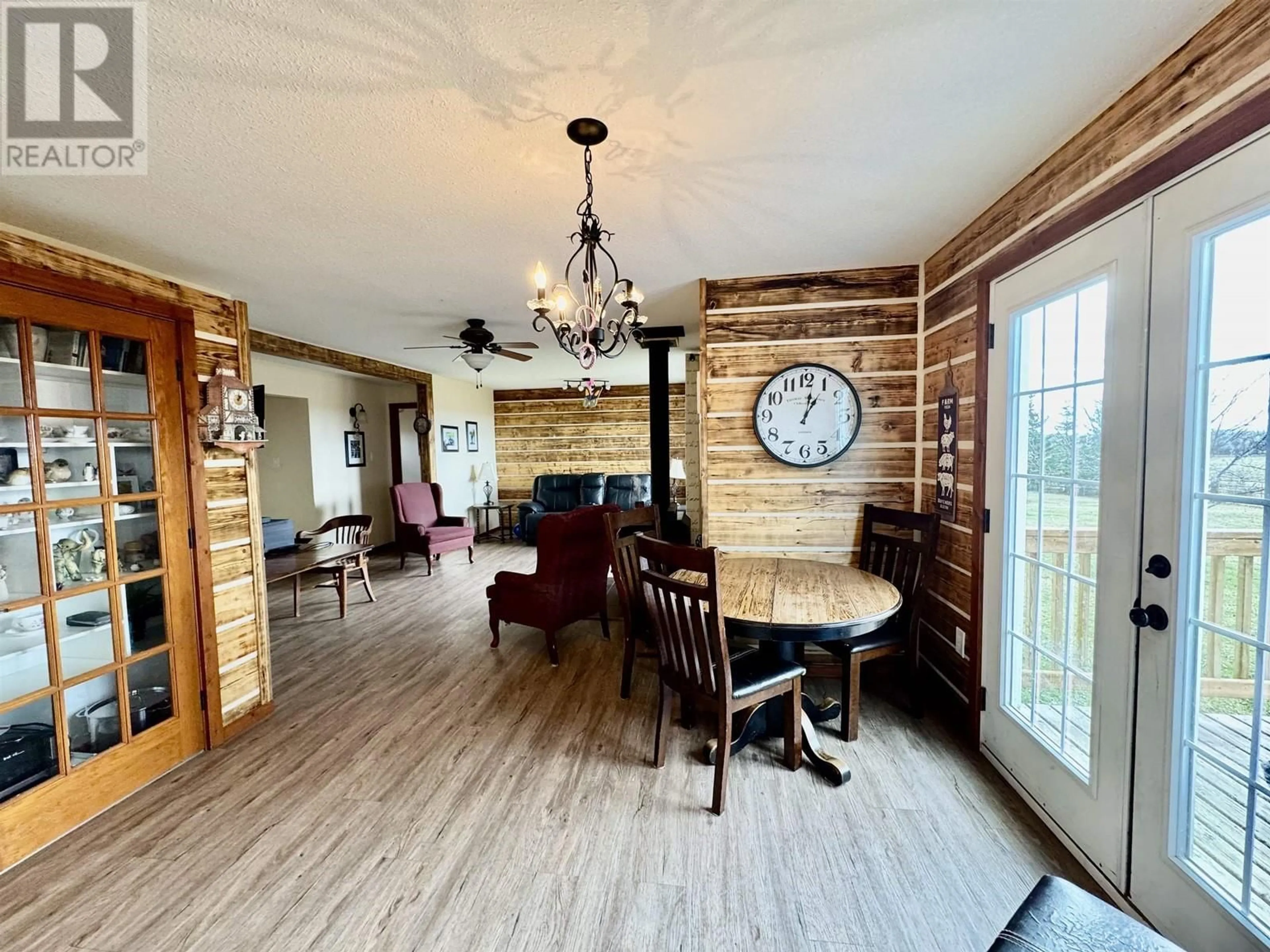 Dining room, wood/laminate floor for 1016 240 ROAD, Fort St. John British Columbia V0C1K0