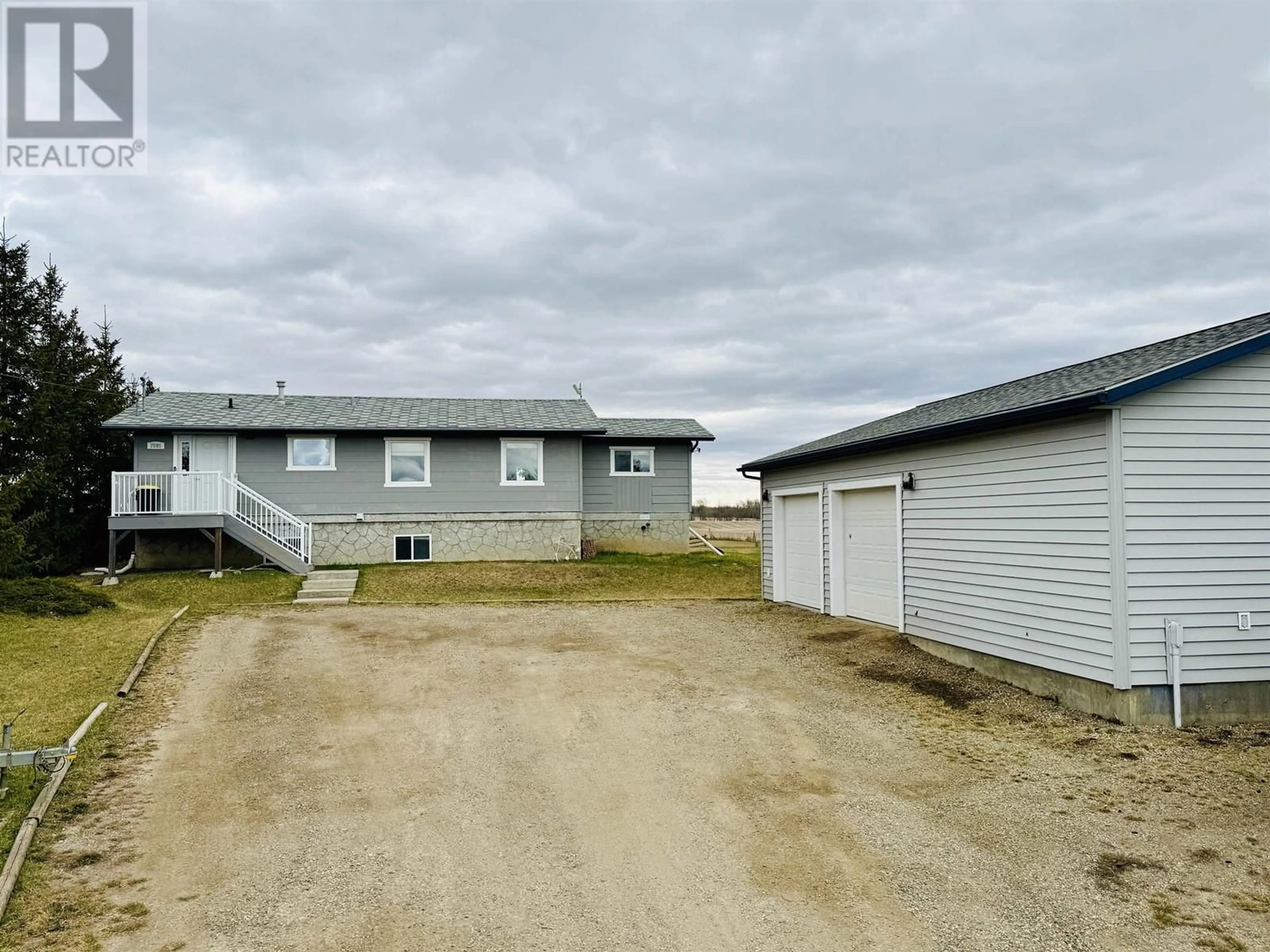 A pic from outside/outdoor area/front of a property/back of a property/a pic from drone, building for 7585 269 ROAD, Fort St. John British Columbia V1J4M7
