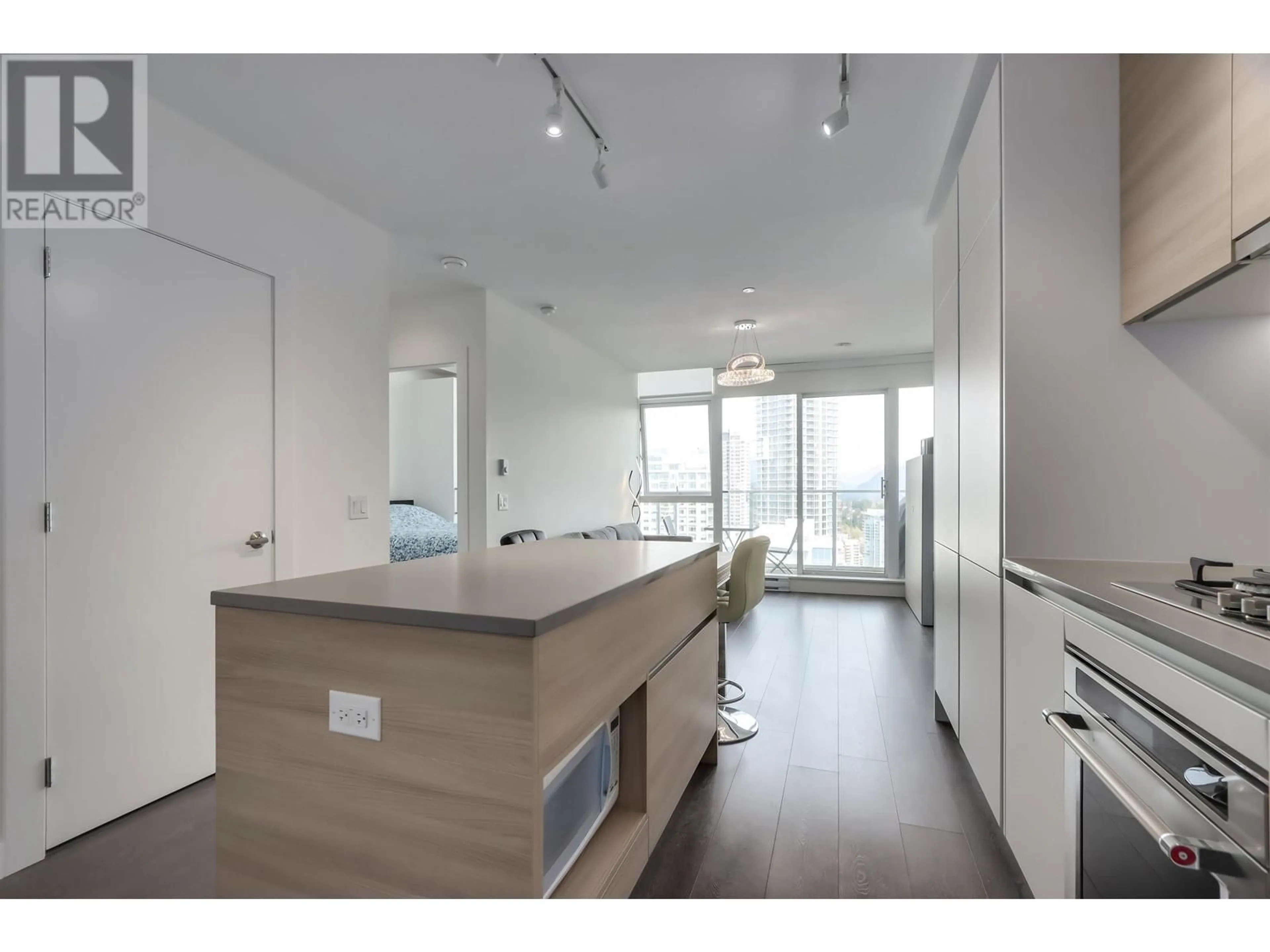 Open concept kitchen, wood/laminate floor for 3601 - 657 WHITING WAY, Coquitlam British Columbia V3J0J6