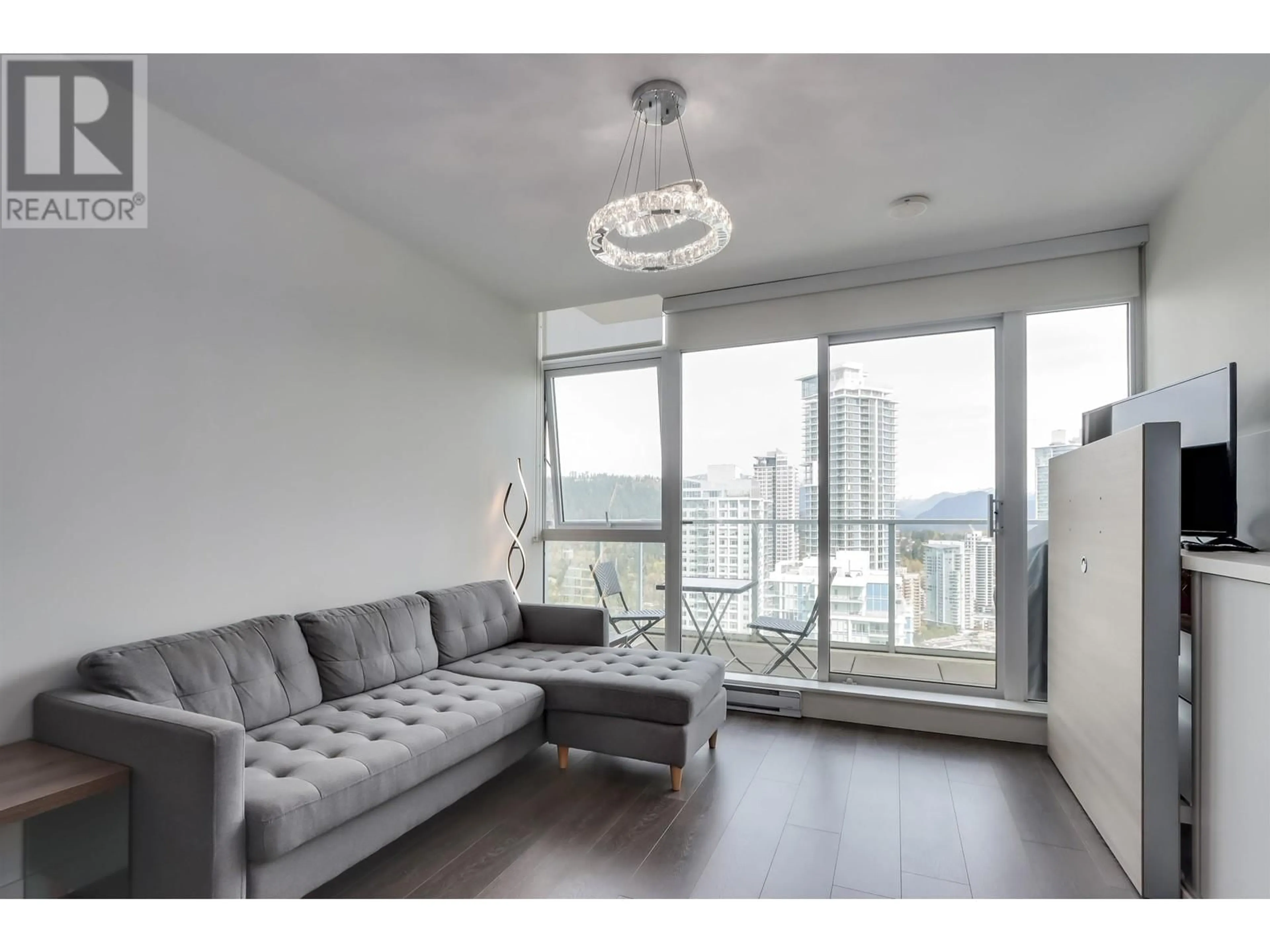 Living room with furniture, wood/laminate floor for 3601 - 657 WHITING WAY, Coquitlam British Columbia V3J0J6