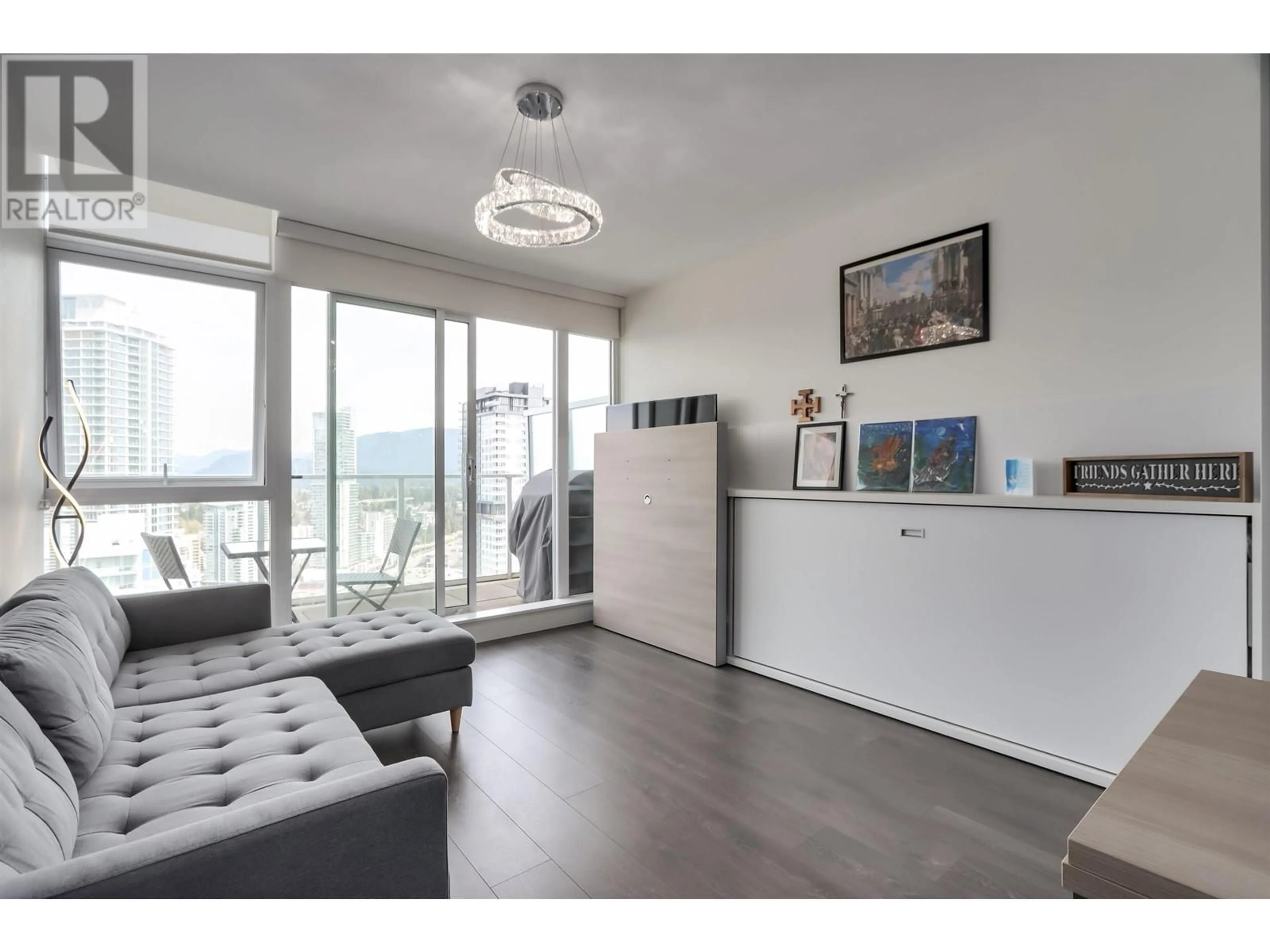 Living room with furniture, wood/laminate floor for 3601 - 657 WHITING WAY, Coquitlam British Columbia V3J0J6