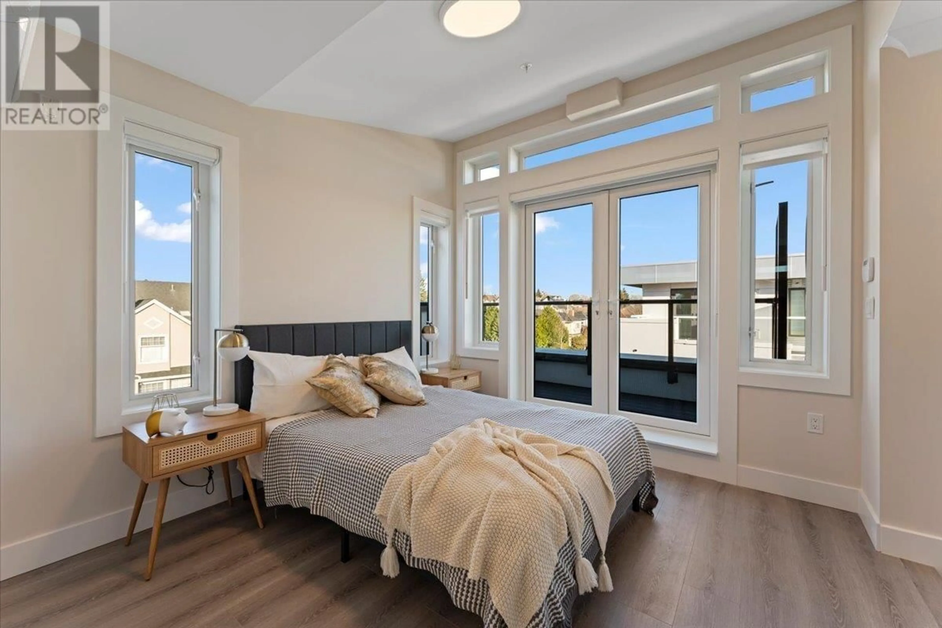 Bedroom with bed, wood/laminate floor for 8319 FRENCH STREET, Vancouver British Columbia V6P4W3