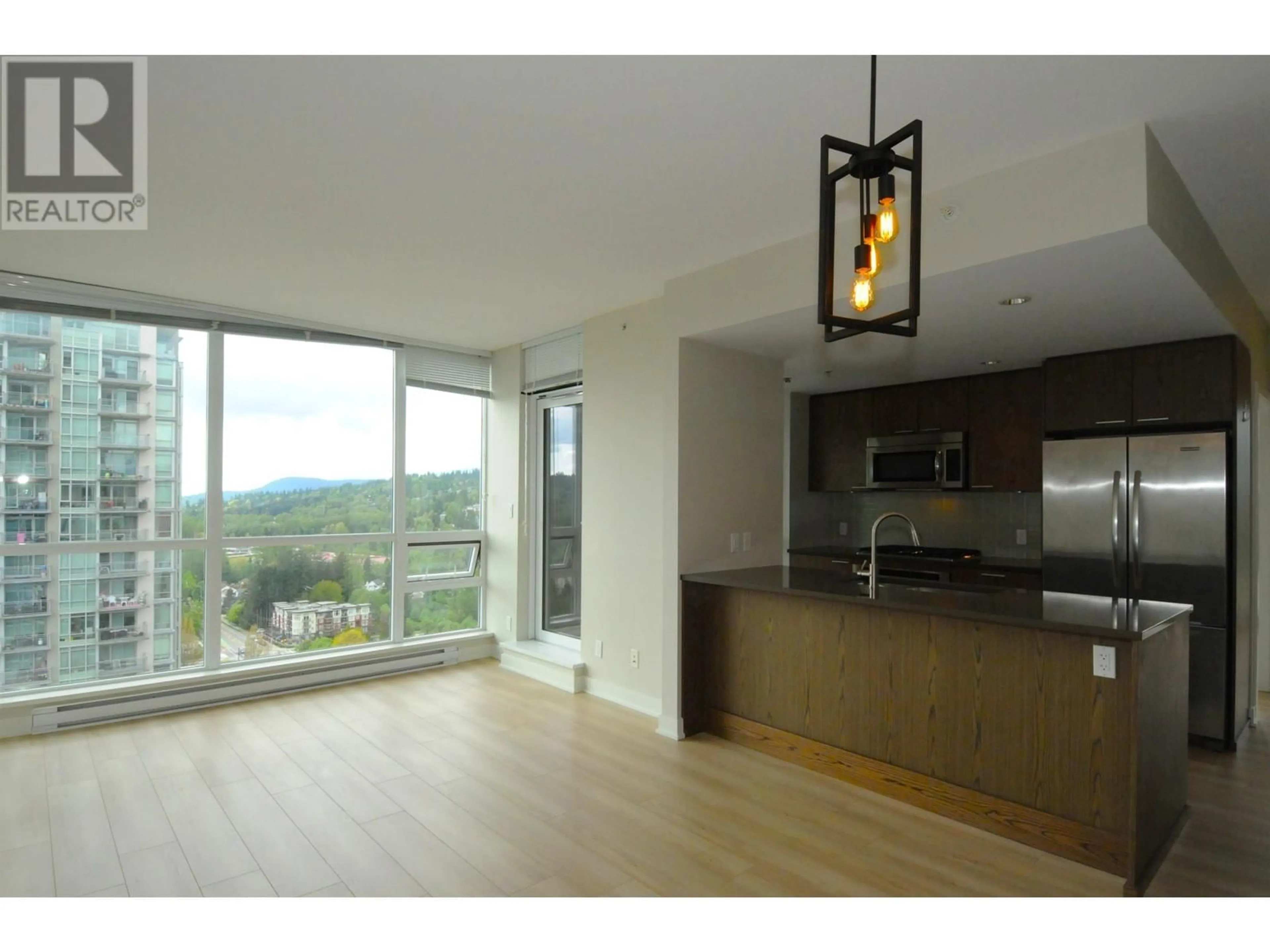Open concept kitchen, wood/laminate floor for 2808 - 2975 ATLANTIC AVENUE, Coquitlam British Columbia V3B0C5