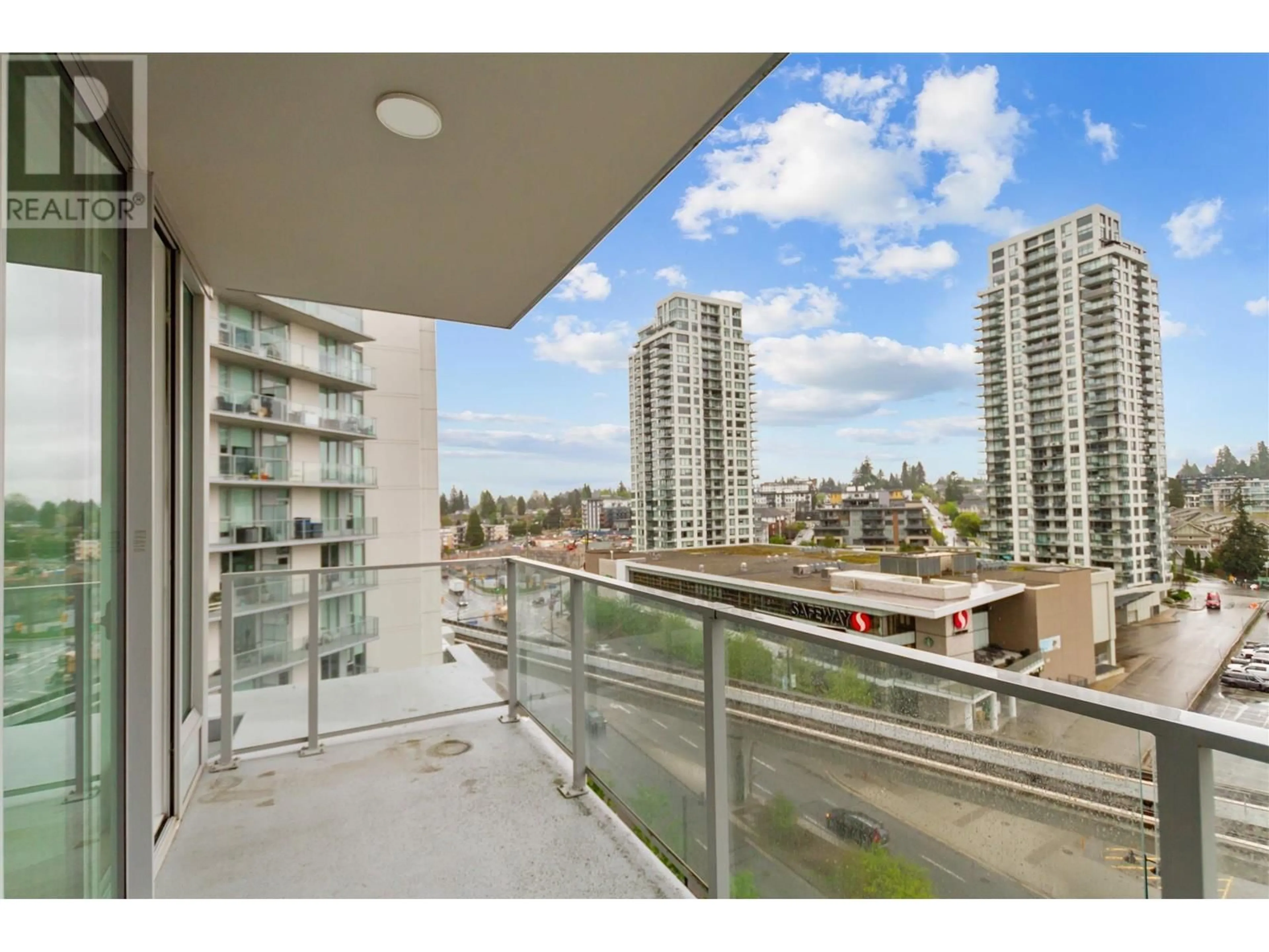 Balcony in the apartment, city buildings view from balcony for 707 - 567 CLARKE ROAD, Coquitlam British Columbia V3J0K7