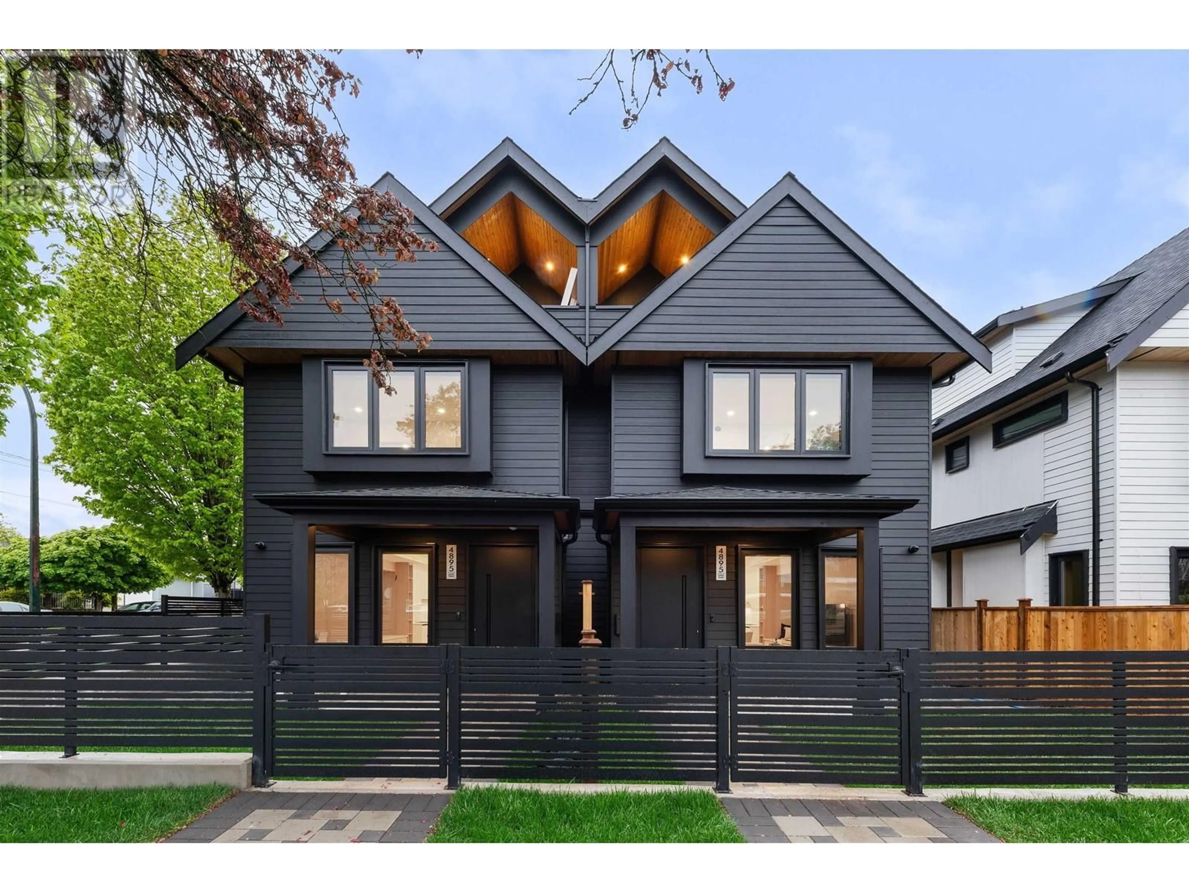 Home with vinyl exterior material, street for 1 - 4895 MOSS STREET, Vancouver British Columbia V5R3T3