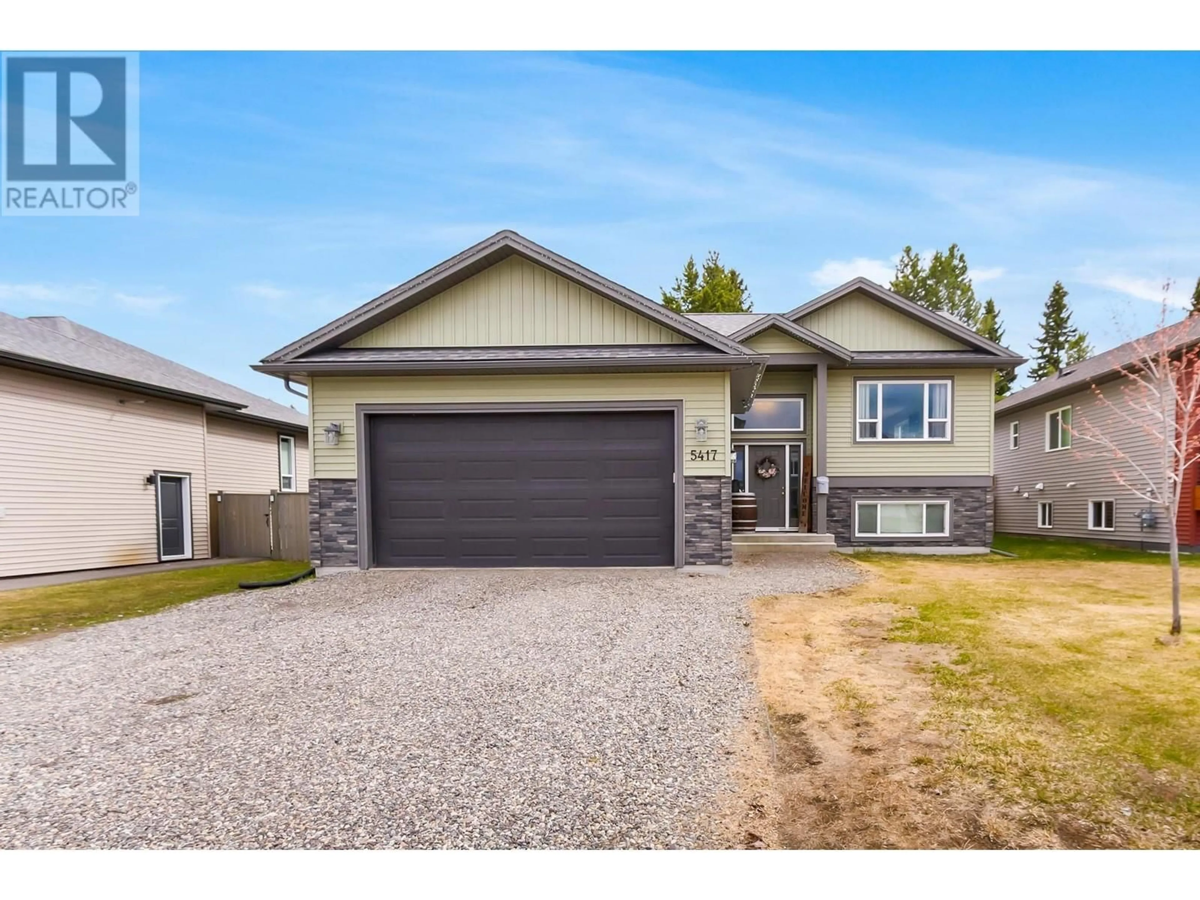 Home with vinyl exterior material, street for 5417 WOODVALLEY DRIVE, Prince George British Columbia V2K5A6