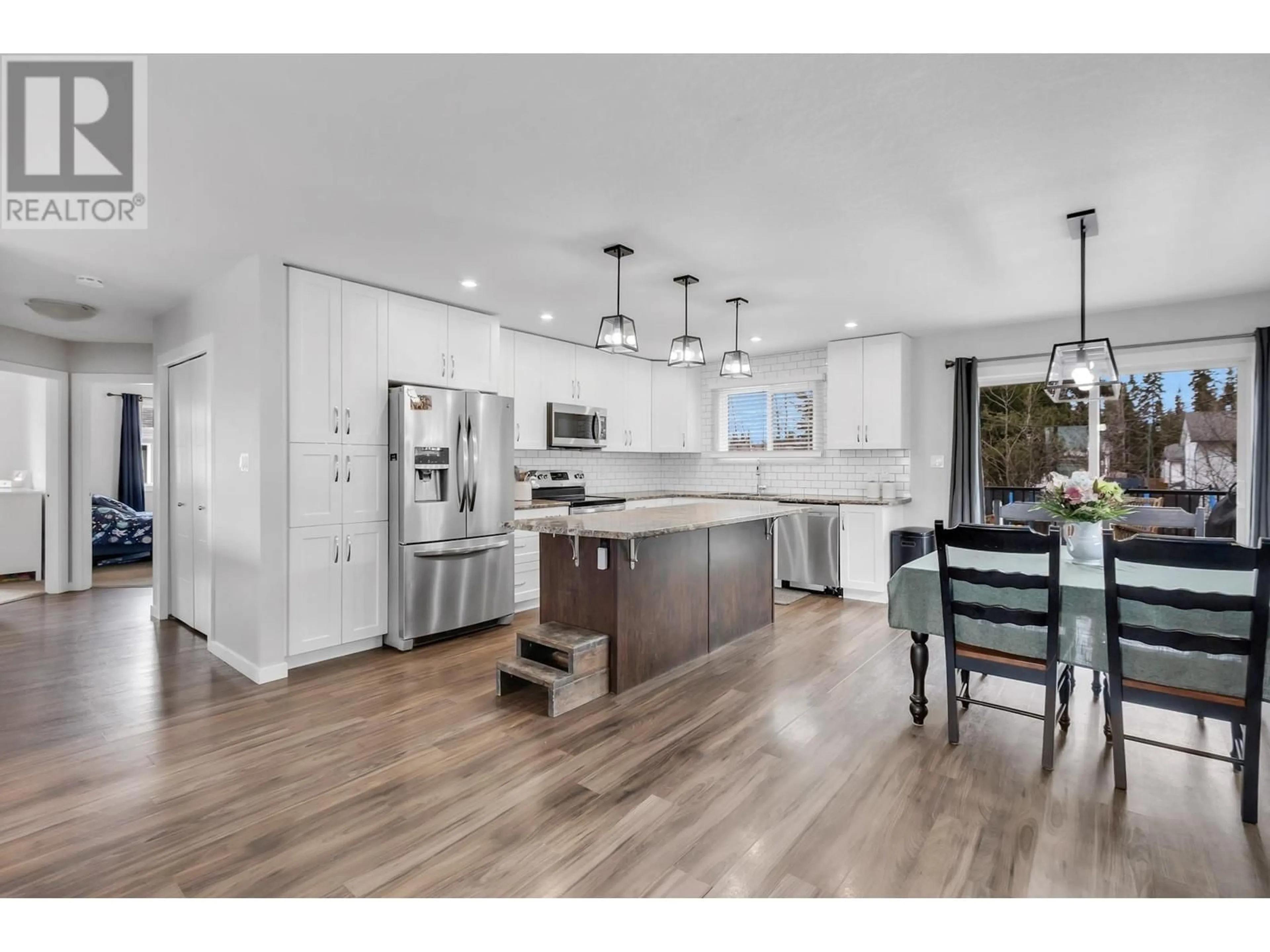 Open concept kitchen, wood/laminate floor for 5417 WOODVALLEY DRIVE, Prince George British Columbia V2K5A6