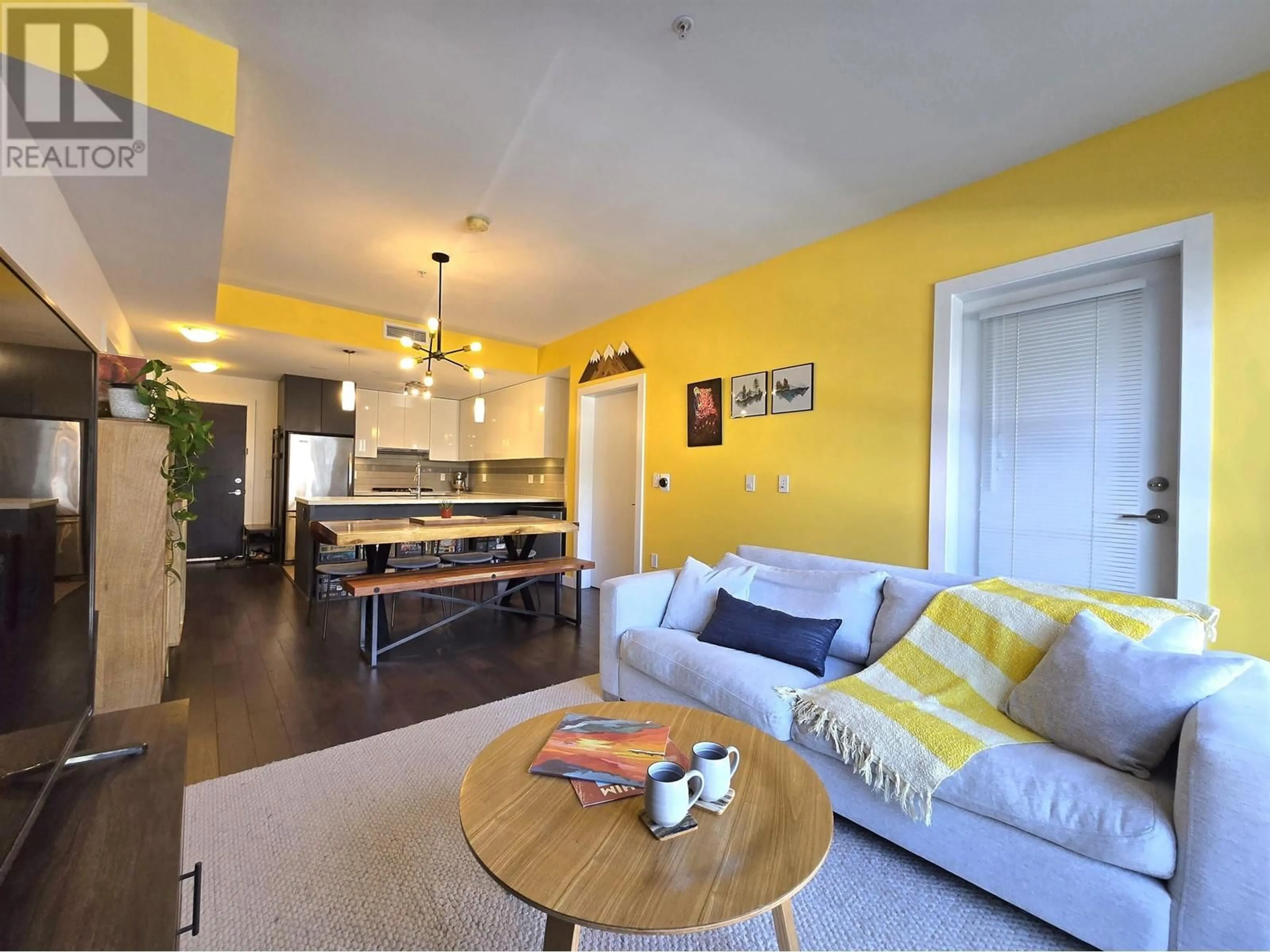 Living room with furniture, wood/laminate floor for 207 - 5399 CEDARBRIDGE WAY, Richmond British Columbia V6X0L6