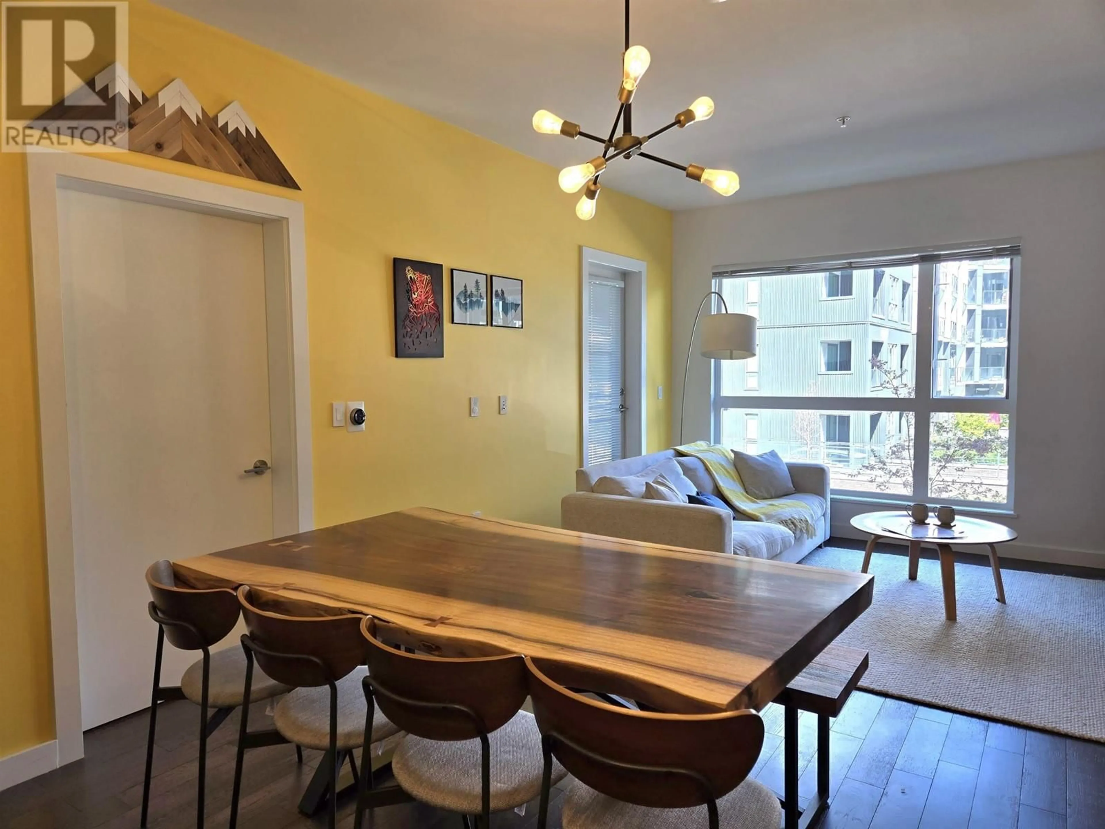 Dining room, wood/laminate floor for 207 - 5399 CEDARBRIDGE WAY, Richmond British Columbia V6X0L6