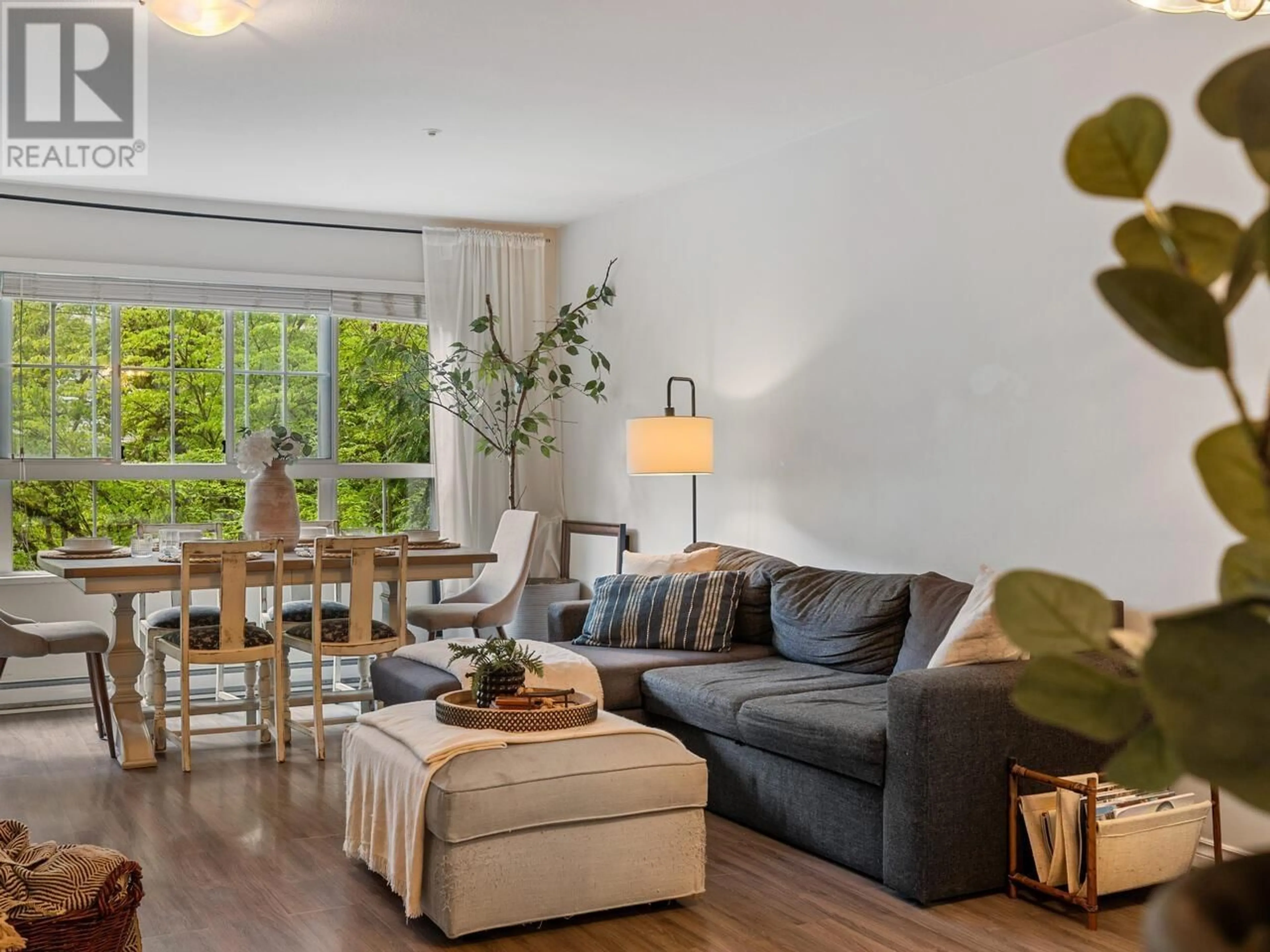 Living room with furniture, wood/laminate floor for 223 - 2980 PRINCESS CRESCENT, Coquitlam British Columbia V3B7R4