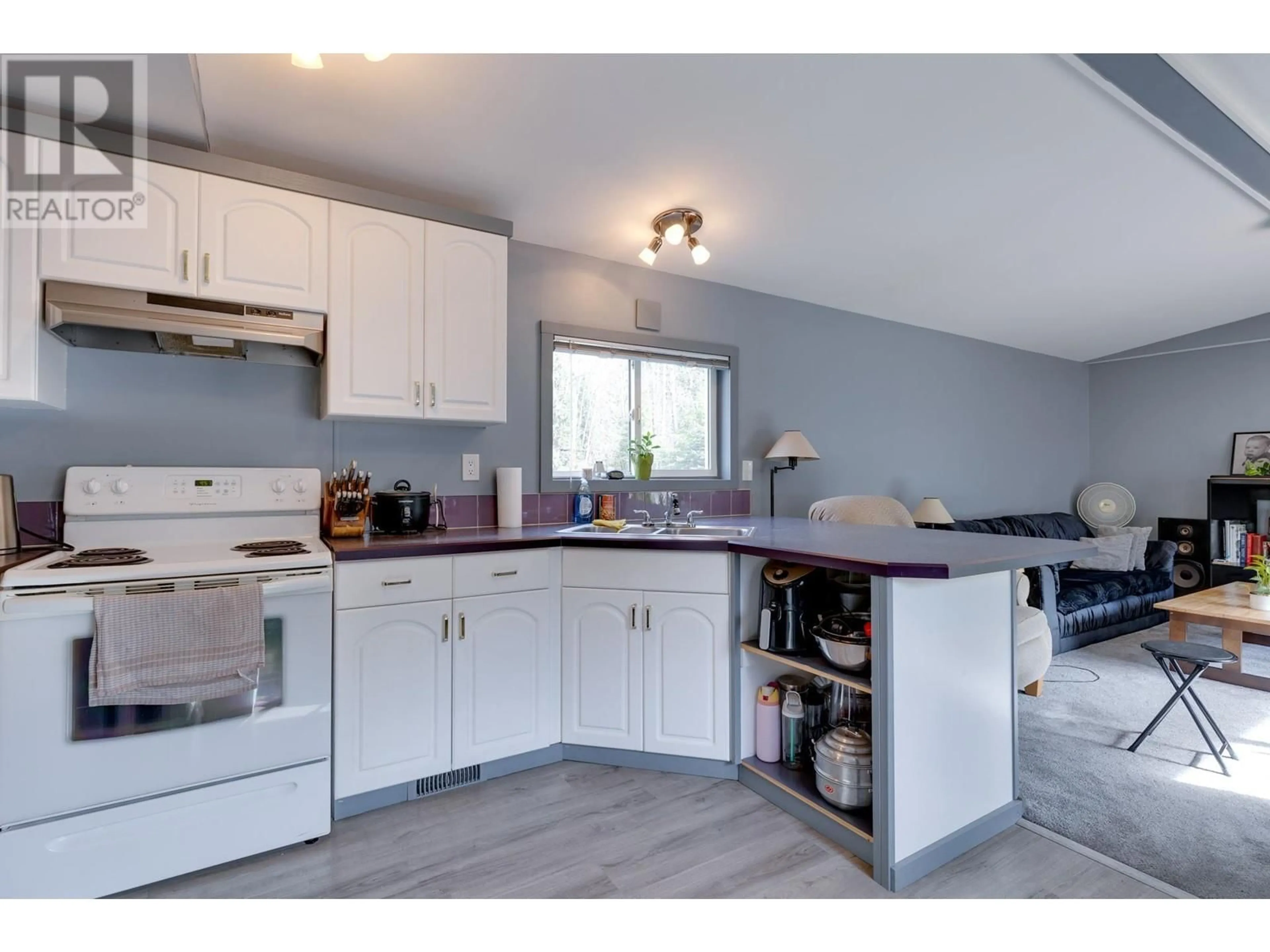 Open concept kitchen, wood/laminate floor for 1729 FRASER FLATS ROAD, Prince George British Columbia V2K5S4