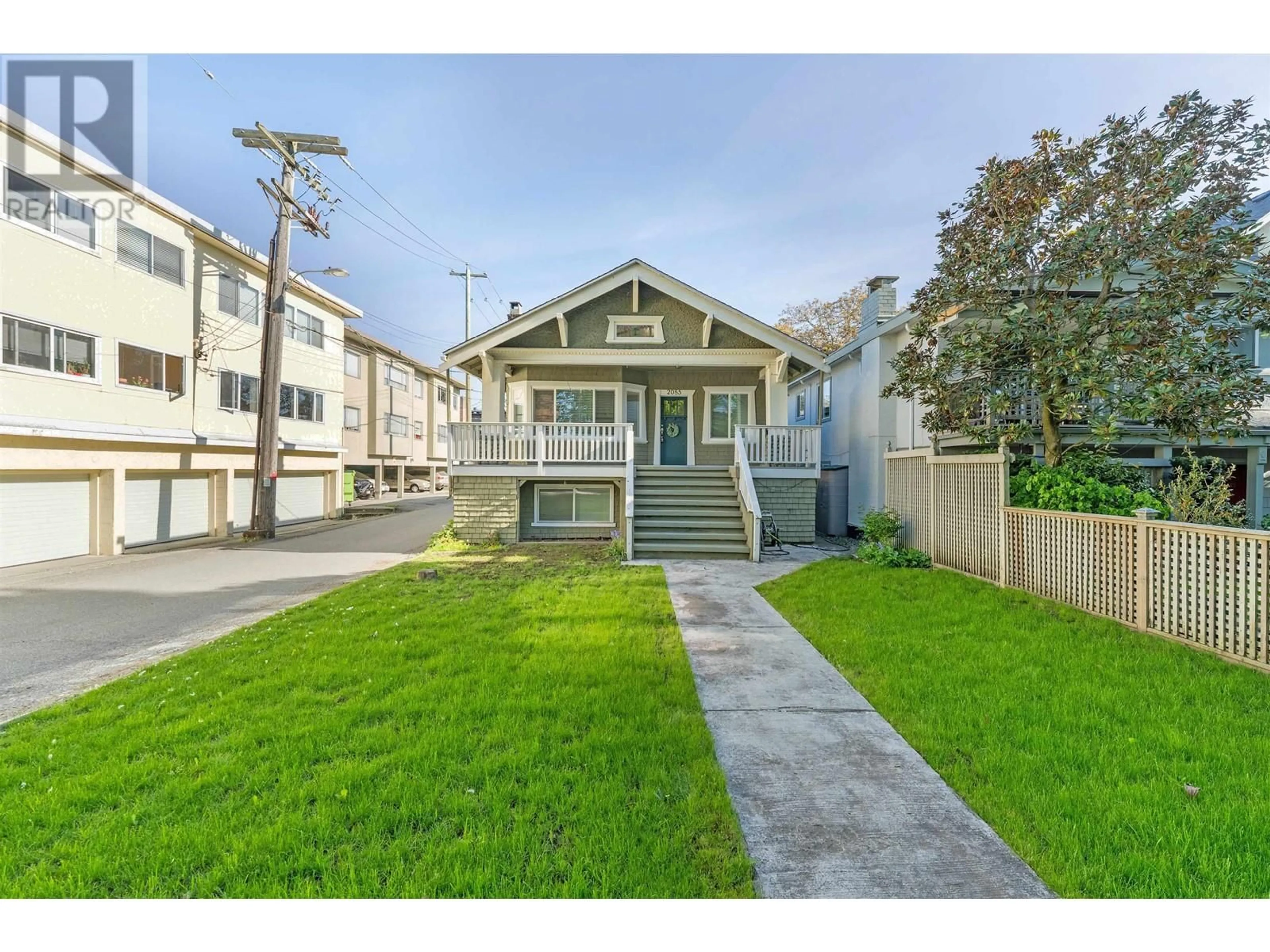 Home with vinyl exterior material, street for 2085 45TH AVENUE, Vancouver British Columbia V6M2H8
