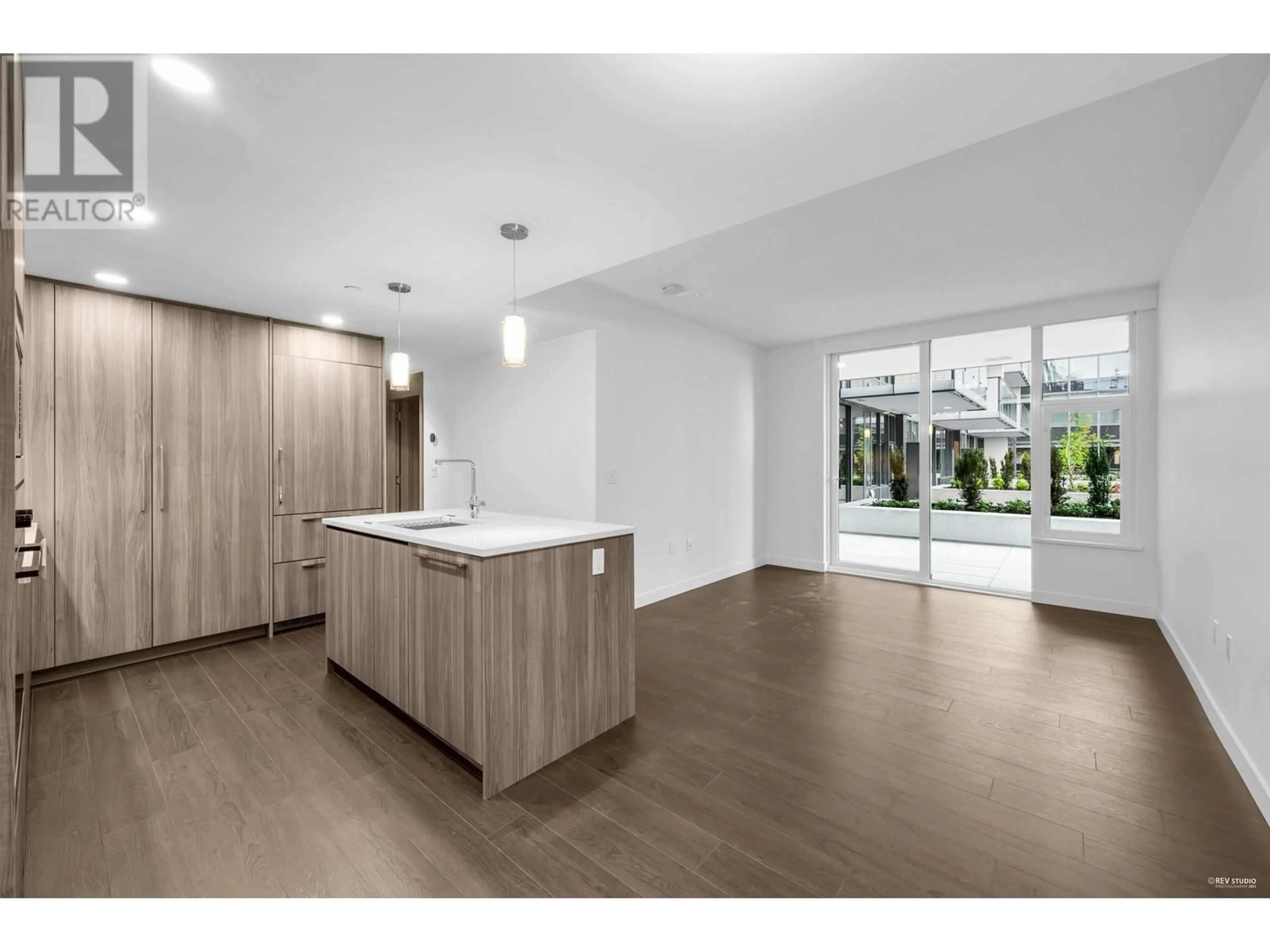 Open concept kitchen, wood/laminate floor for 416 - 8611 HAZELBRIDGE WAY, Richmond British Columbia V6X0W8