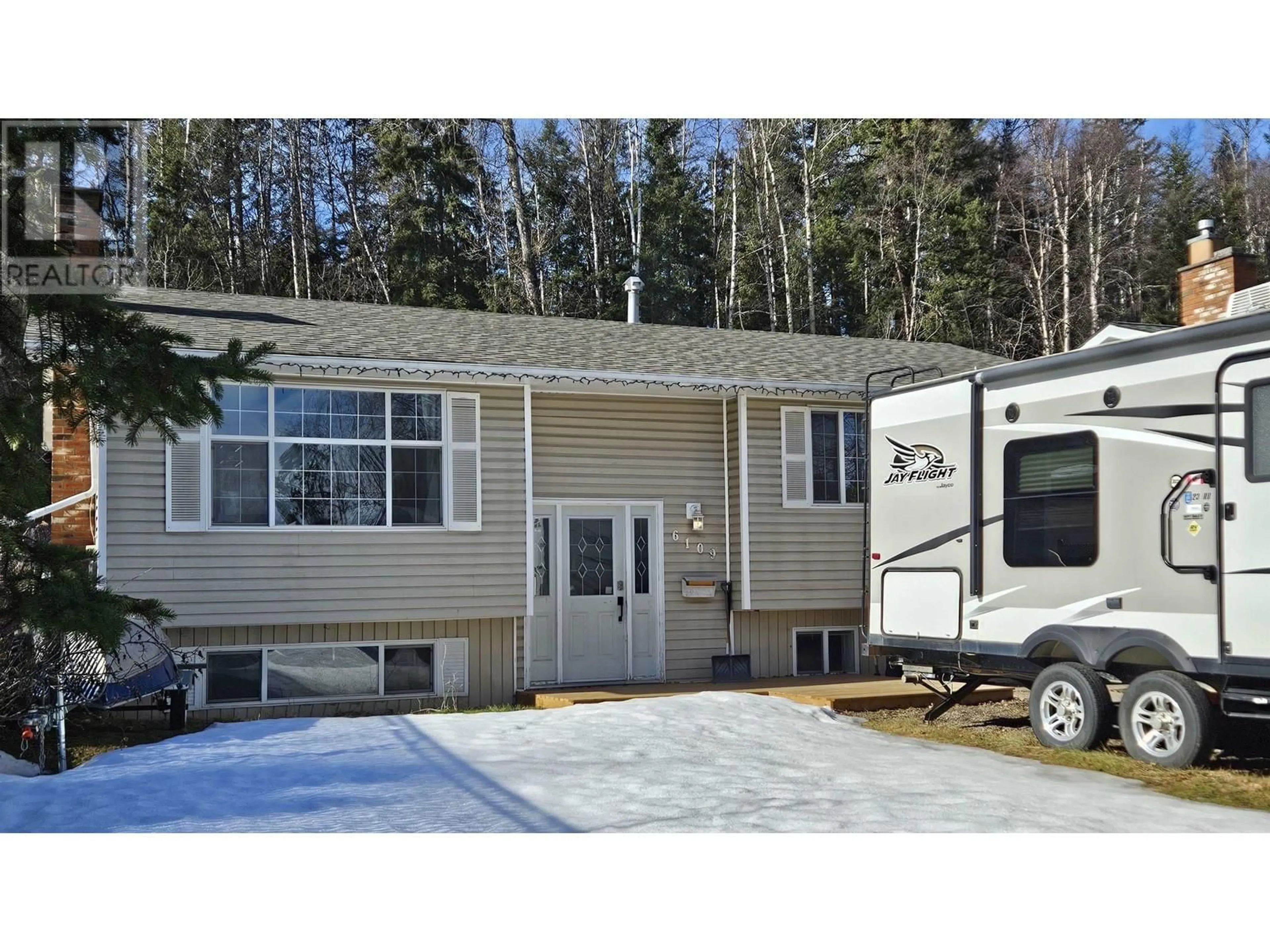 Home with vinyl exterior material, street for 6109 CALEDONIA CRESCENT, Prince George British Columbia V2N2H5