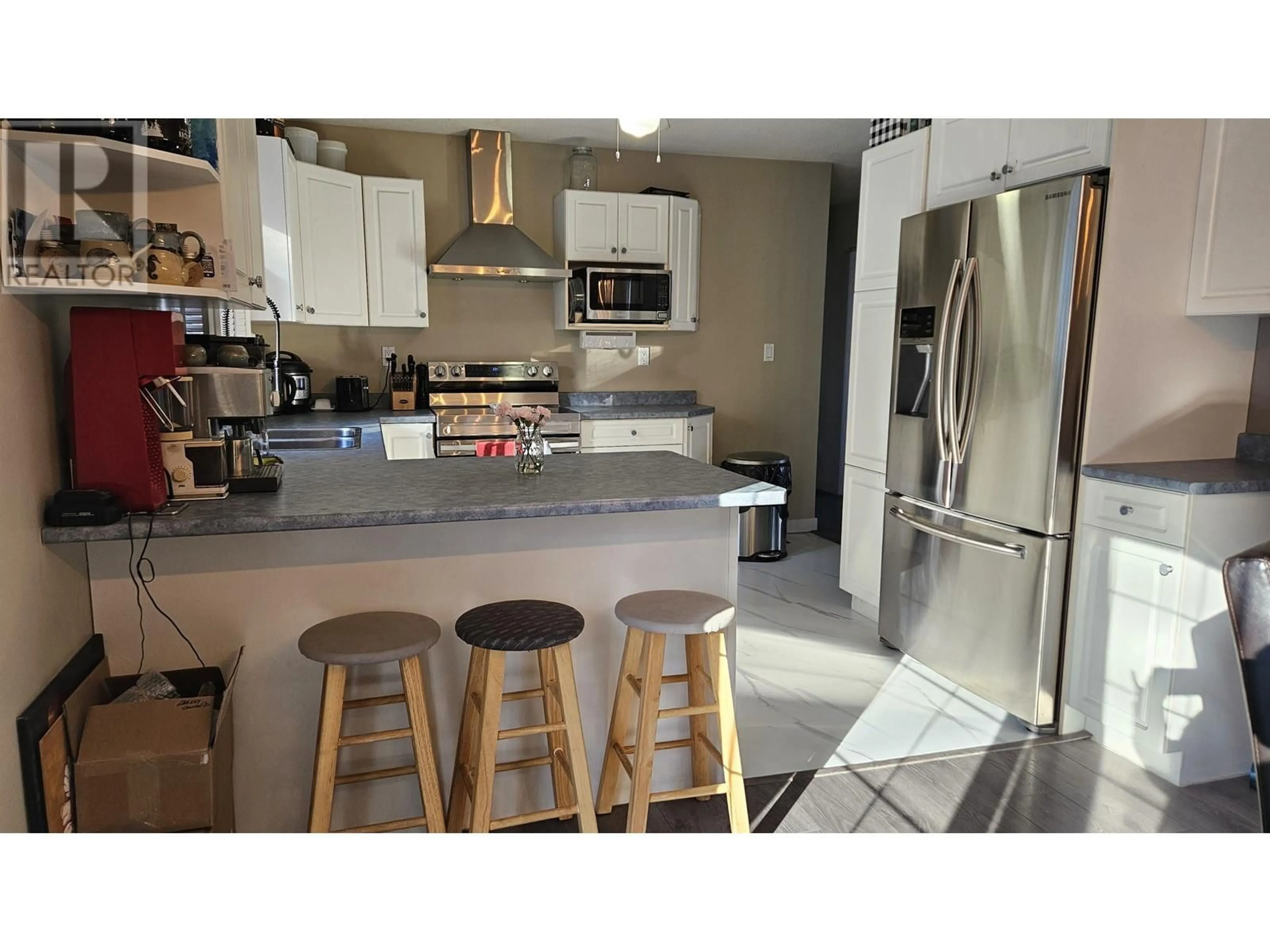 Open concept kitchen, ceramic/tile floor for 6109 CALEDONIA CRESCENT, Prince George British Columbia V2N2H5