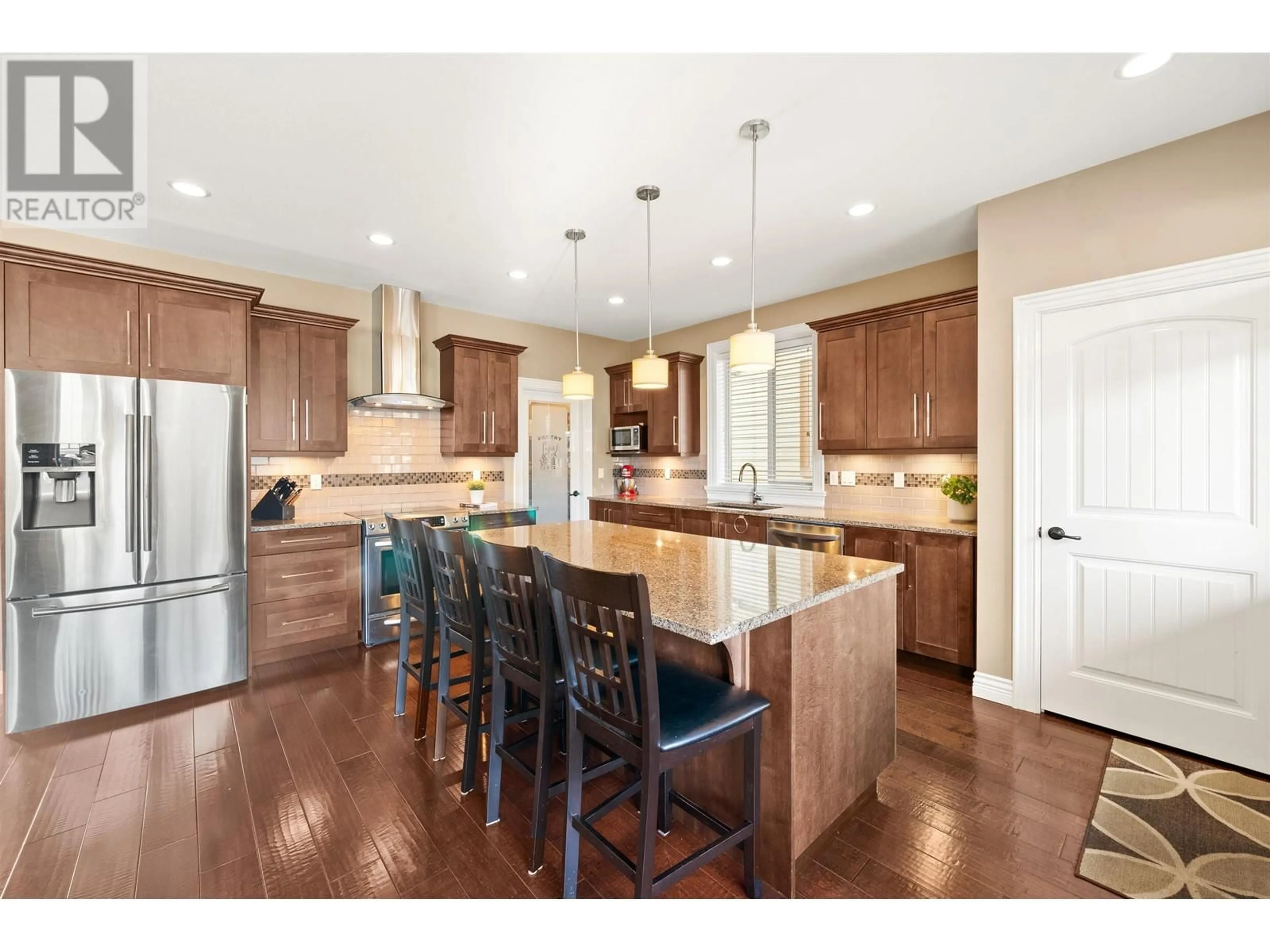 Open concept kitchen, wood/laminate floor for 1215 BURKEMONT PLACE, Coquitlam British Columbia V3B0C8