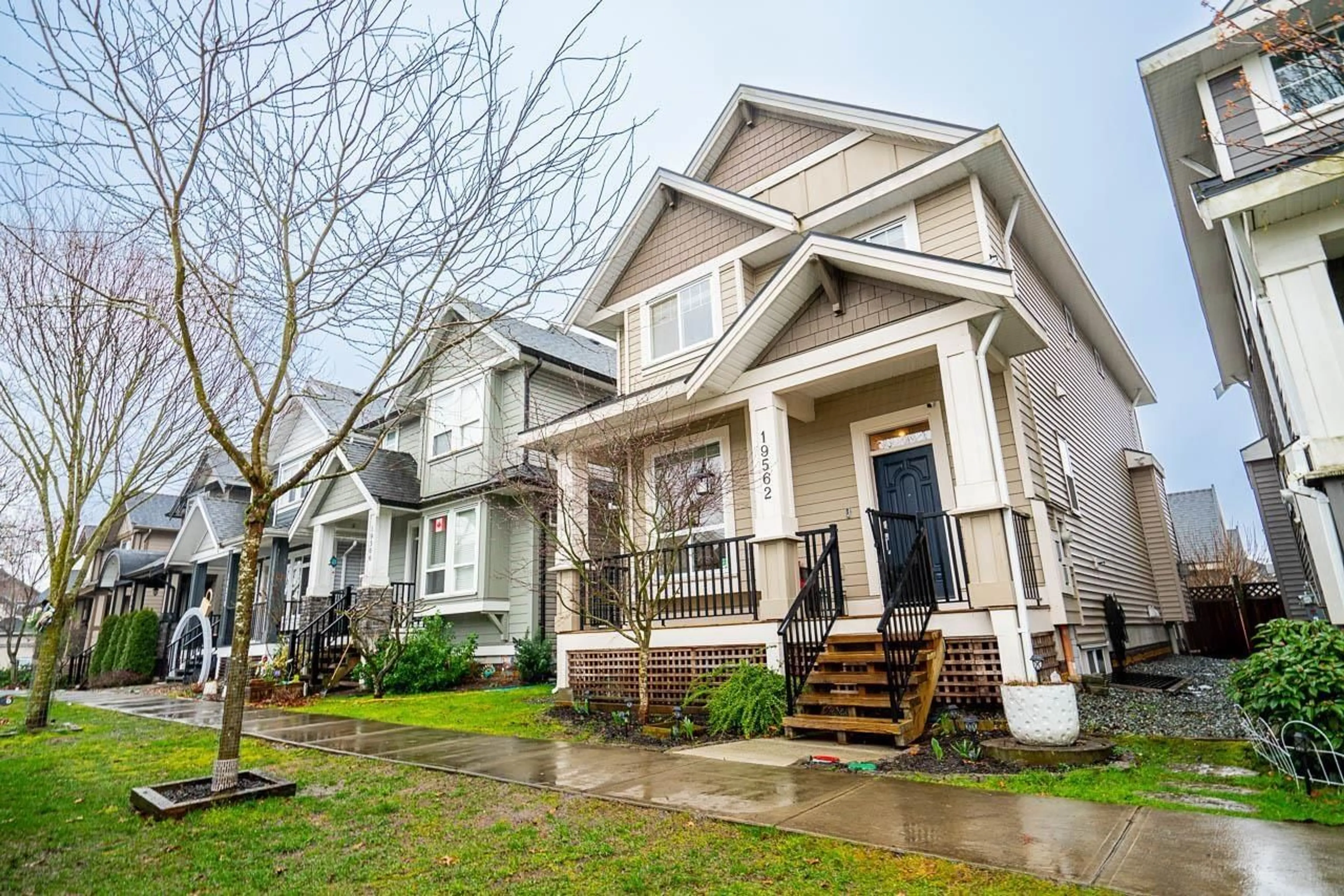Home with vinyl exterior material, street for 19562 72A, Surrey British Columbia V4N3E8