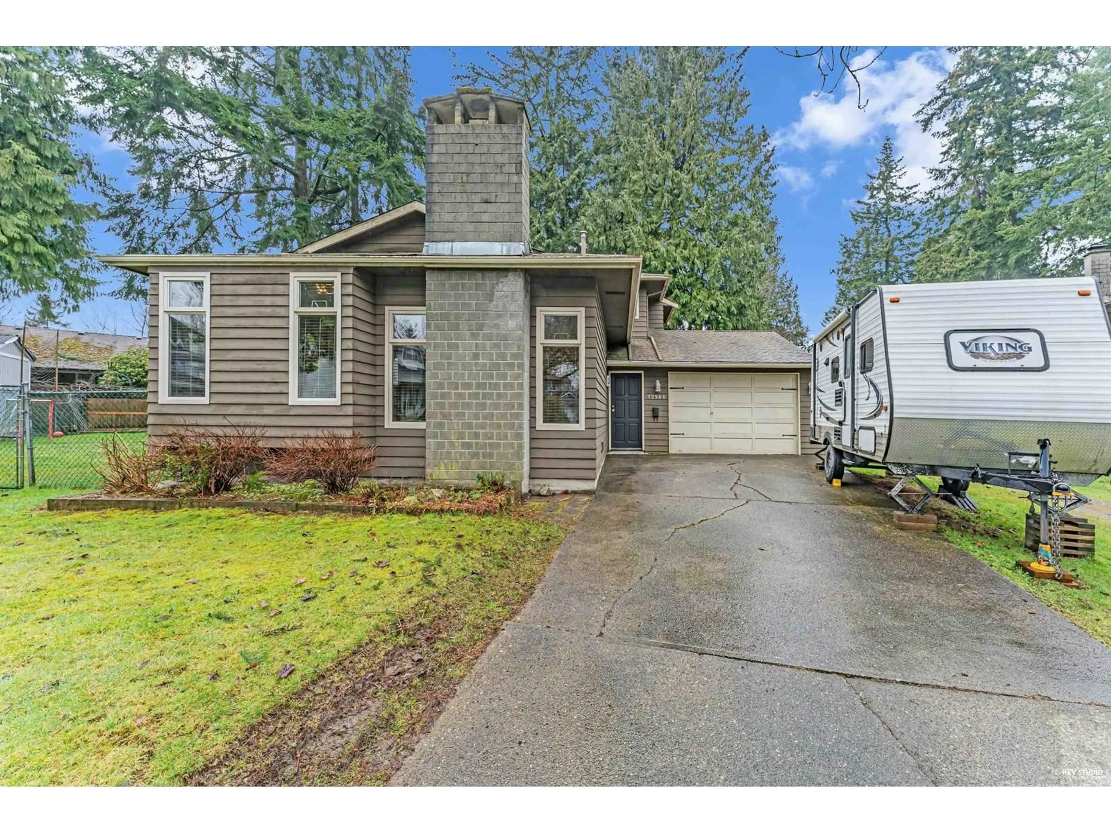 Home with vinyl exterior material, street for 12966 61B, Surrey British Columbia V3X3G5