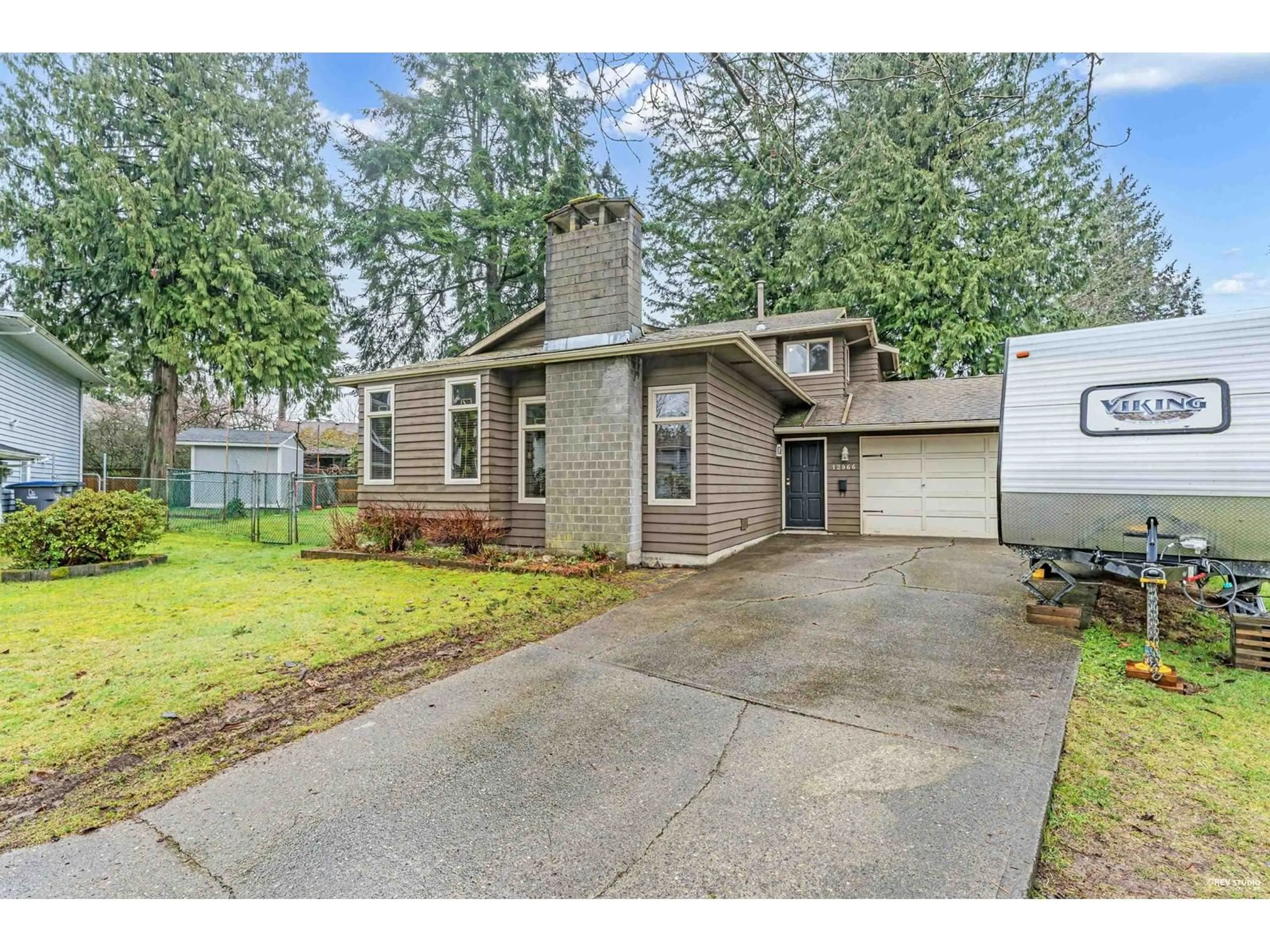 Home with vinyl exterior material, street for 12966 61B, Surrey British Columbia V3X3G5