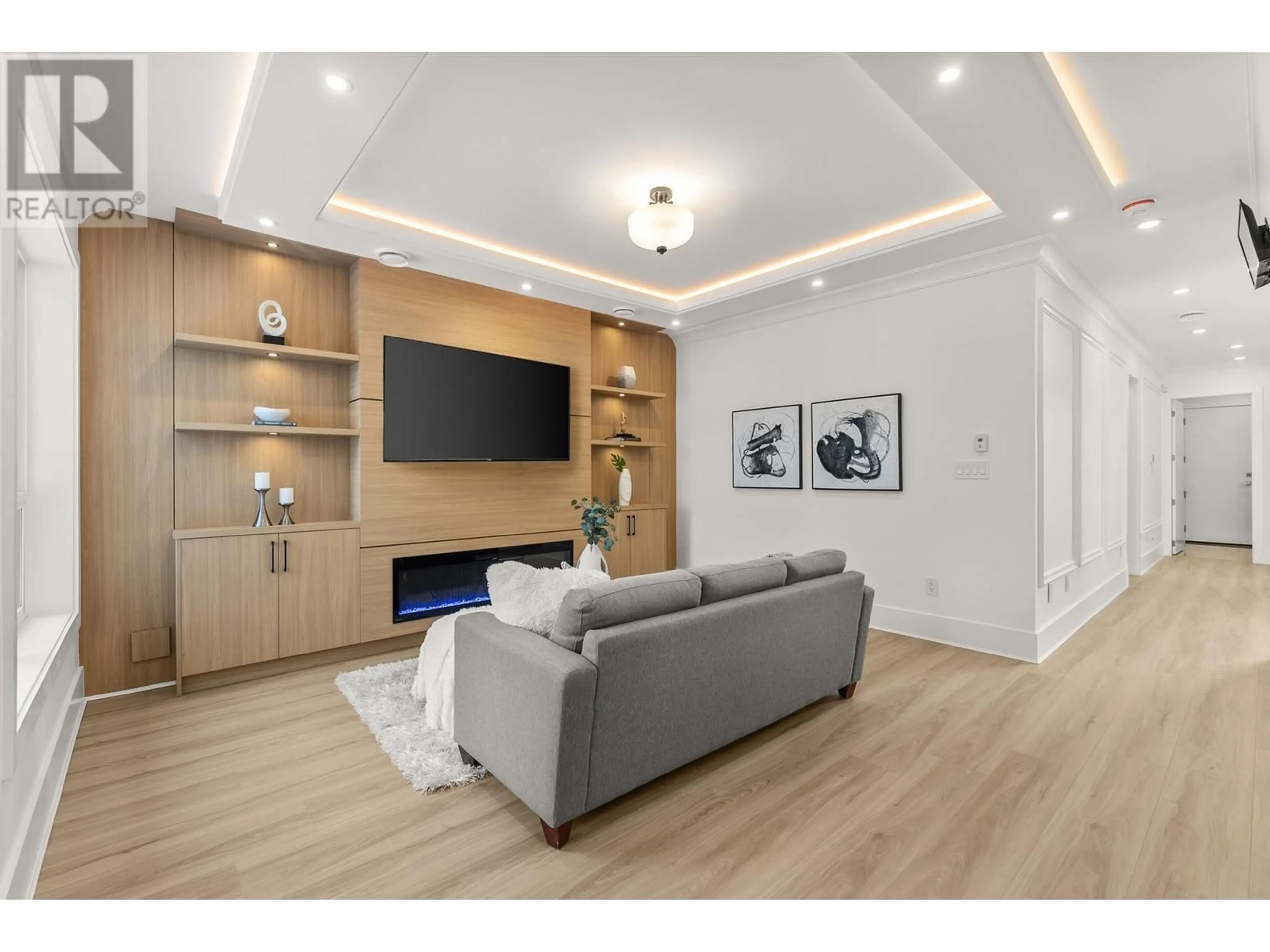 Living room with furniture, wood/laminate floor for 3715 GARRY STREET, Richmond British Columbia V7E2T6