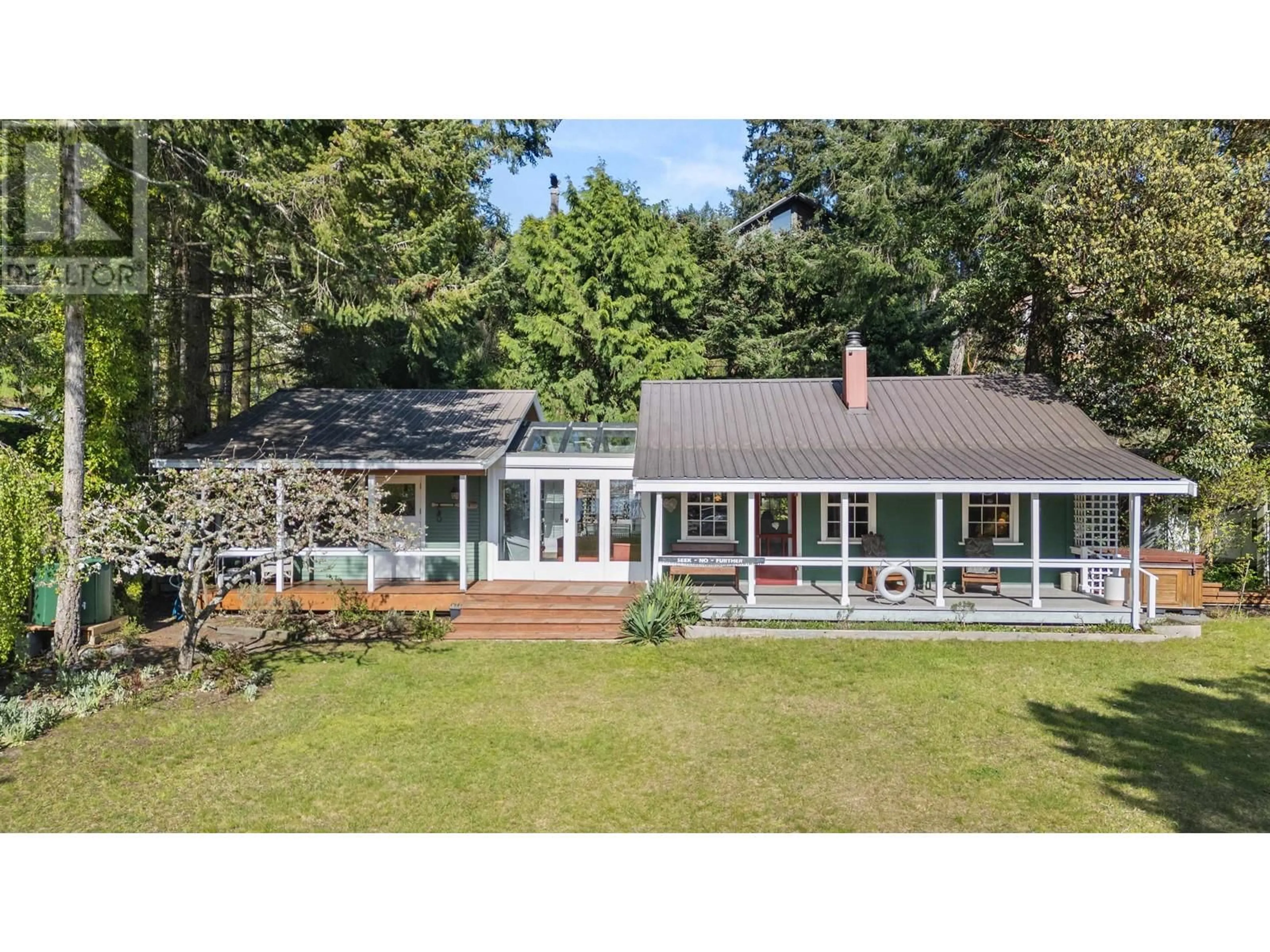 A pic from outside/outdoor area/front of a property/back of a property/a pic from drone, water/lake/river/ocean view for 5400 SANS SOUCI ROAD, Halfmoon Bay British Columbia V7Z1B6