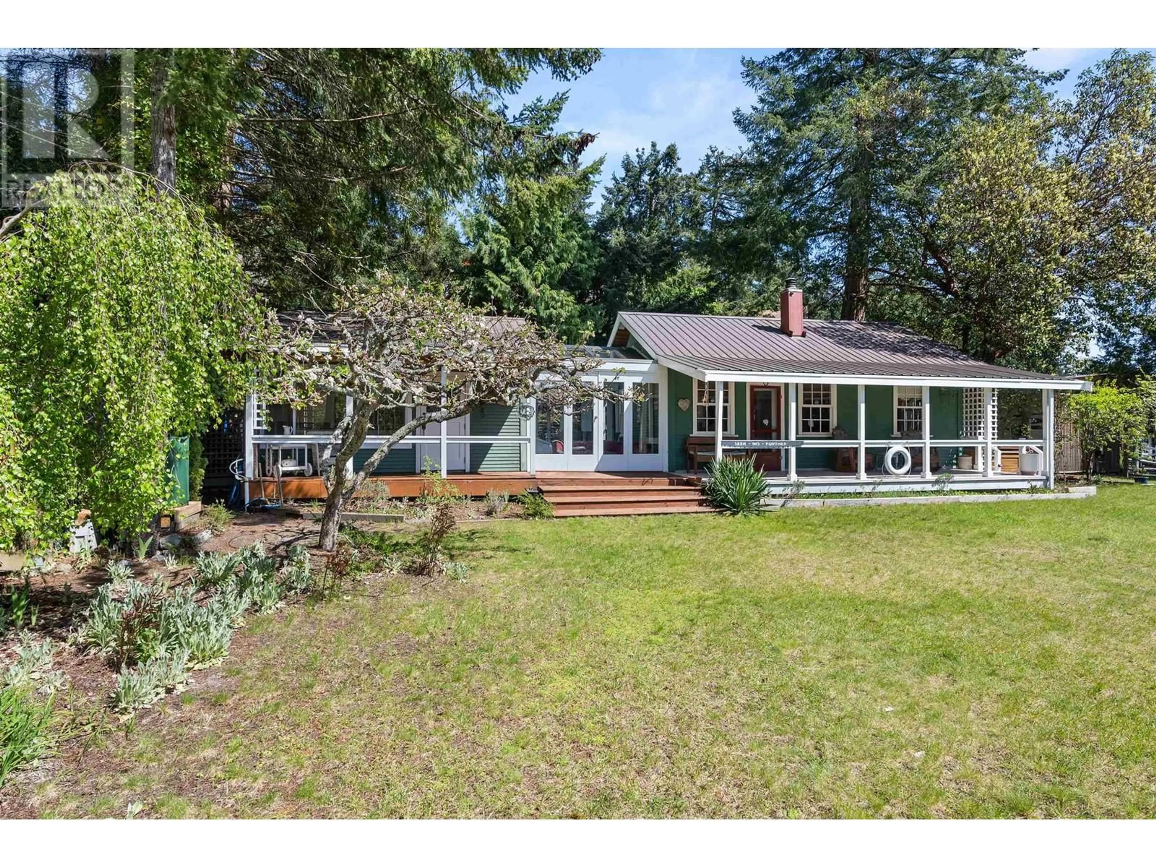 A pic from outside/outdoor area/front of a property/back of a property/a pic from drone, water/lake/river/ocean view for 5400 SANS SOUCI ROAD, Halfmoon Bay British Columbia V7Z1B6